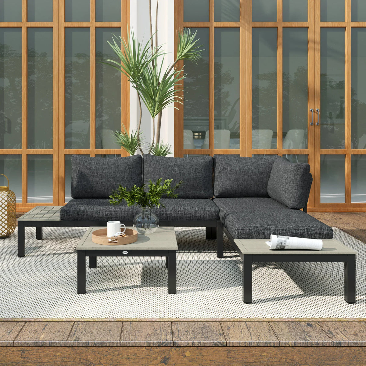 Dark gray outdoor corner sofa with two bench seats and square coffee table in front view