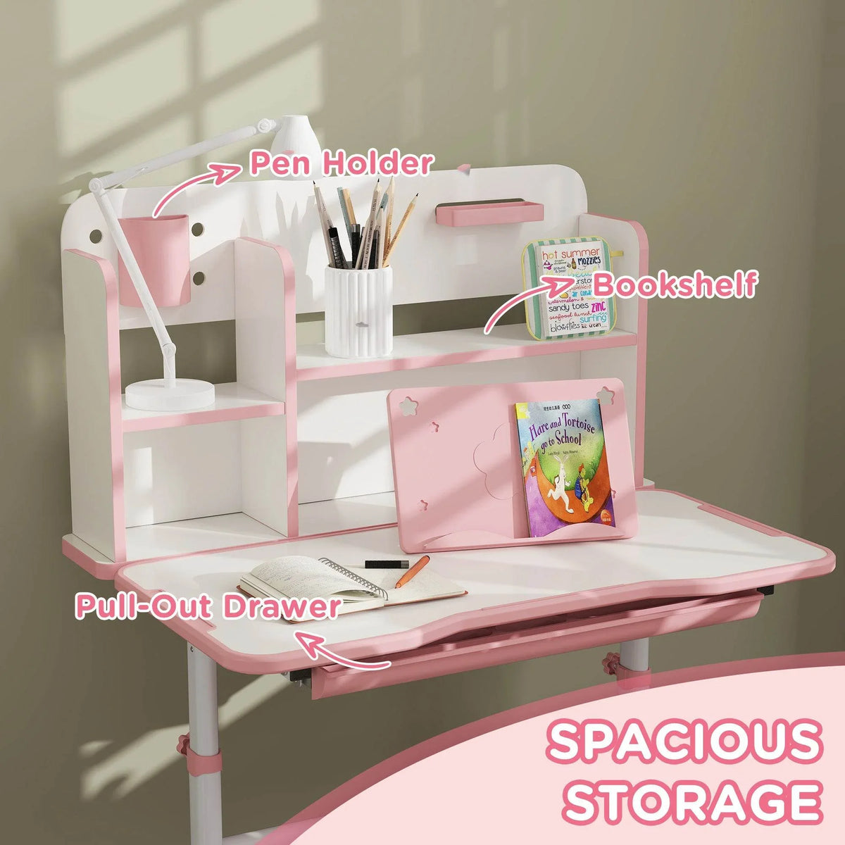 Pink children's study desk with pull-out drawer, pen holder, and book shelf