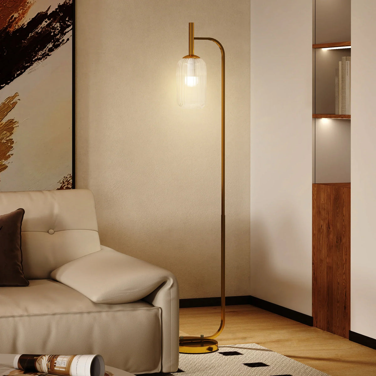 Gold LED floor lamp with clear glass shade and curved metal pole, standing lamp