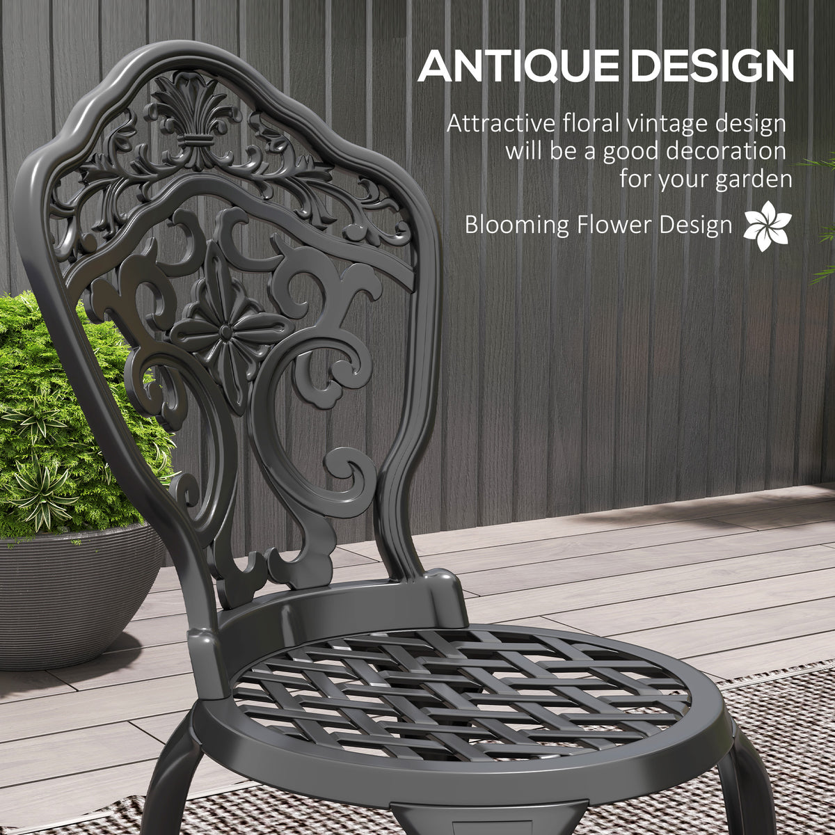 Black ornate metal bistro chair with floral back and slatted seat