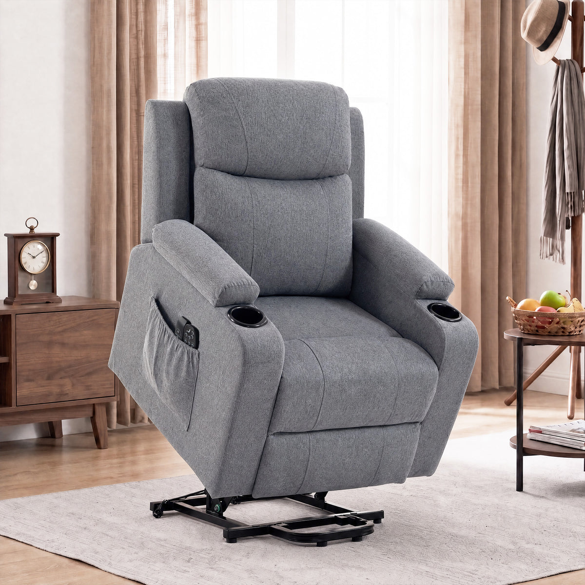 Gray fabric recliner chair with wide arms, built-in cup holders, and reclined seat