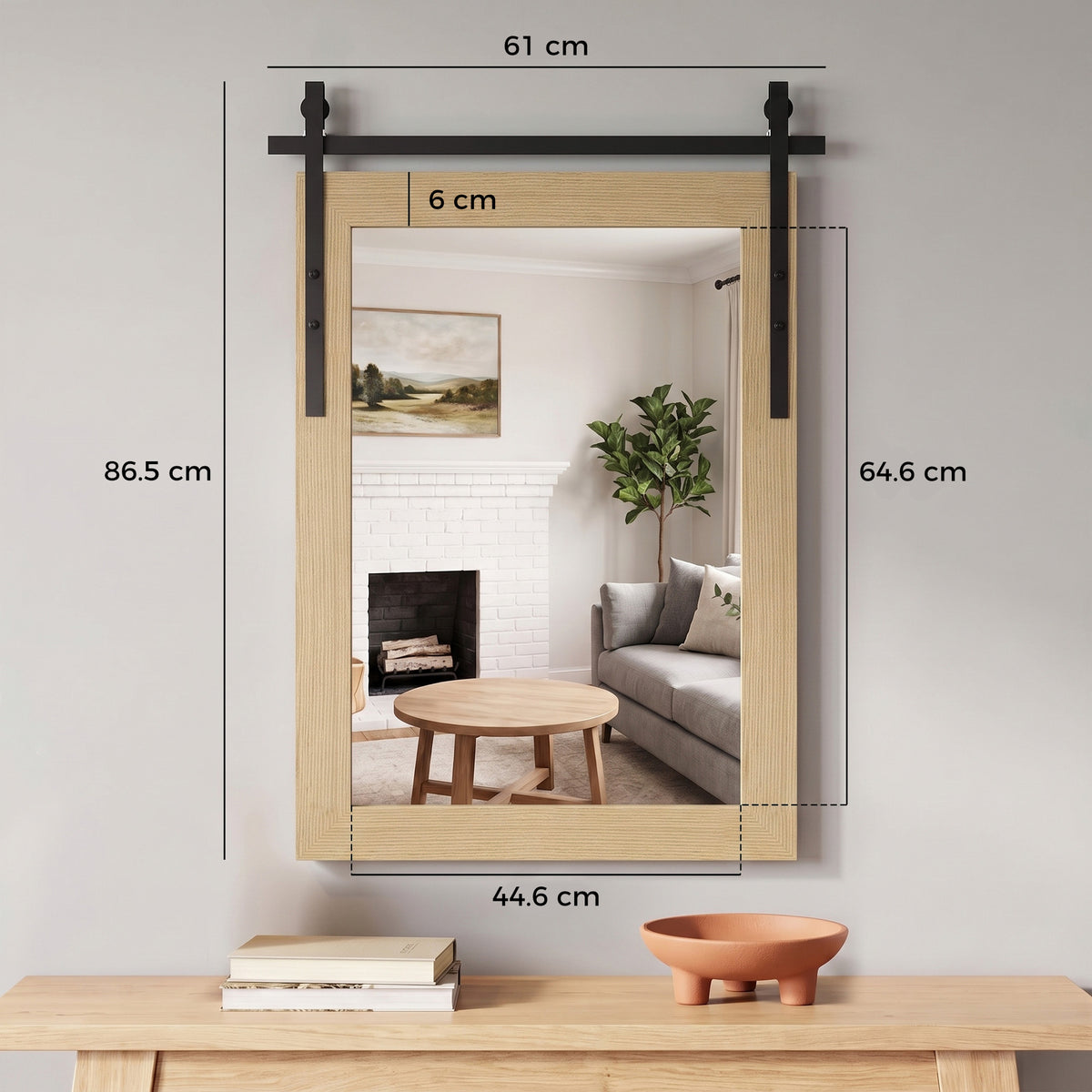Wall mirror with light wood frame, black end bars, and measured dimensions