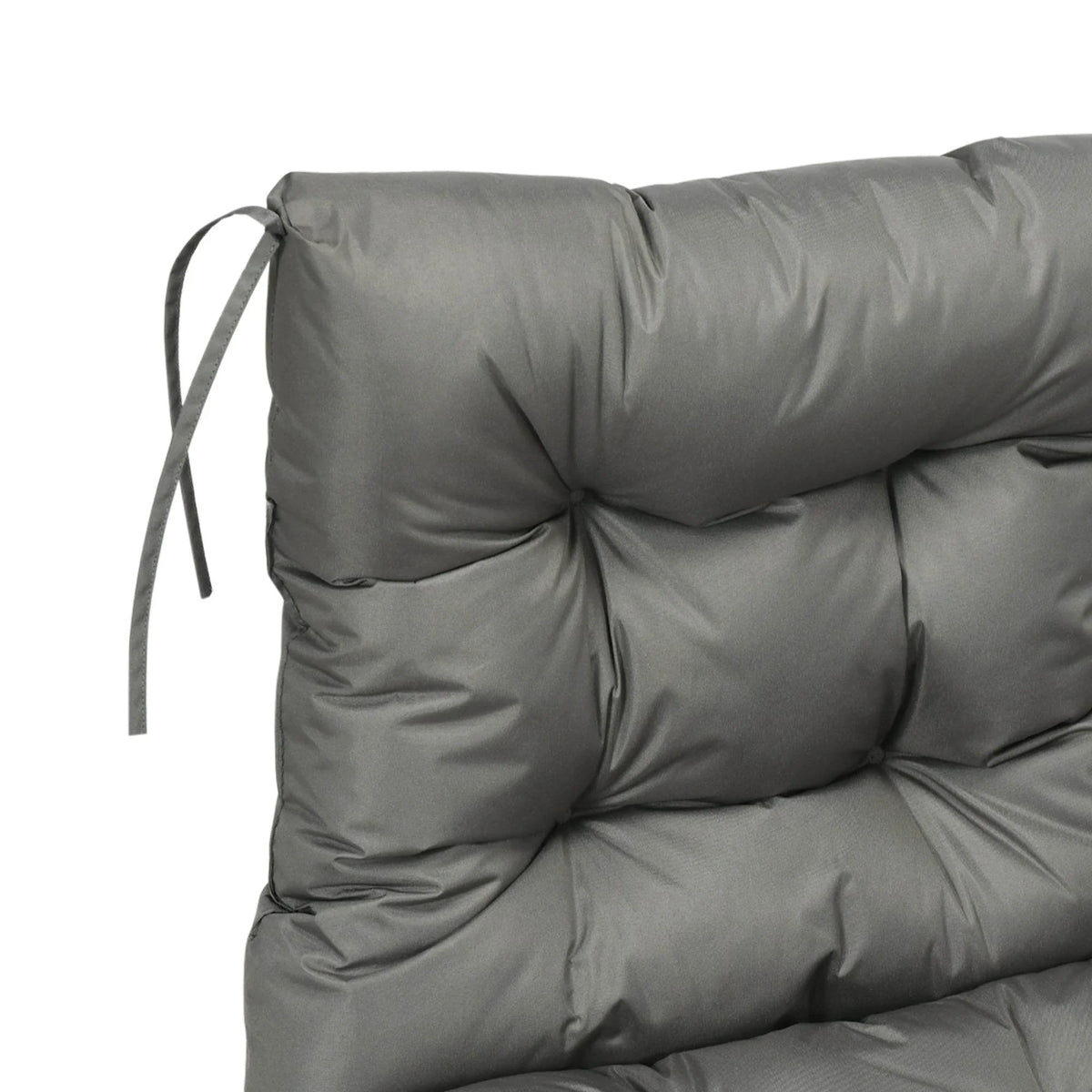 Light grey chair cushion with backrest, close view of corner ties and tufted panels