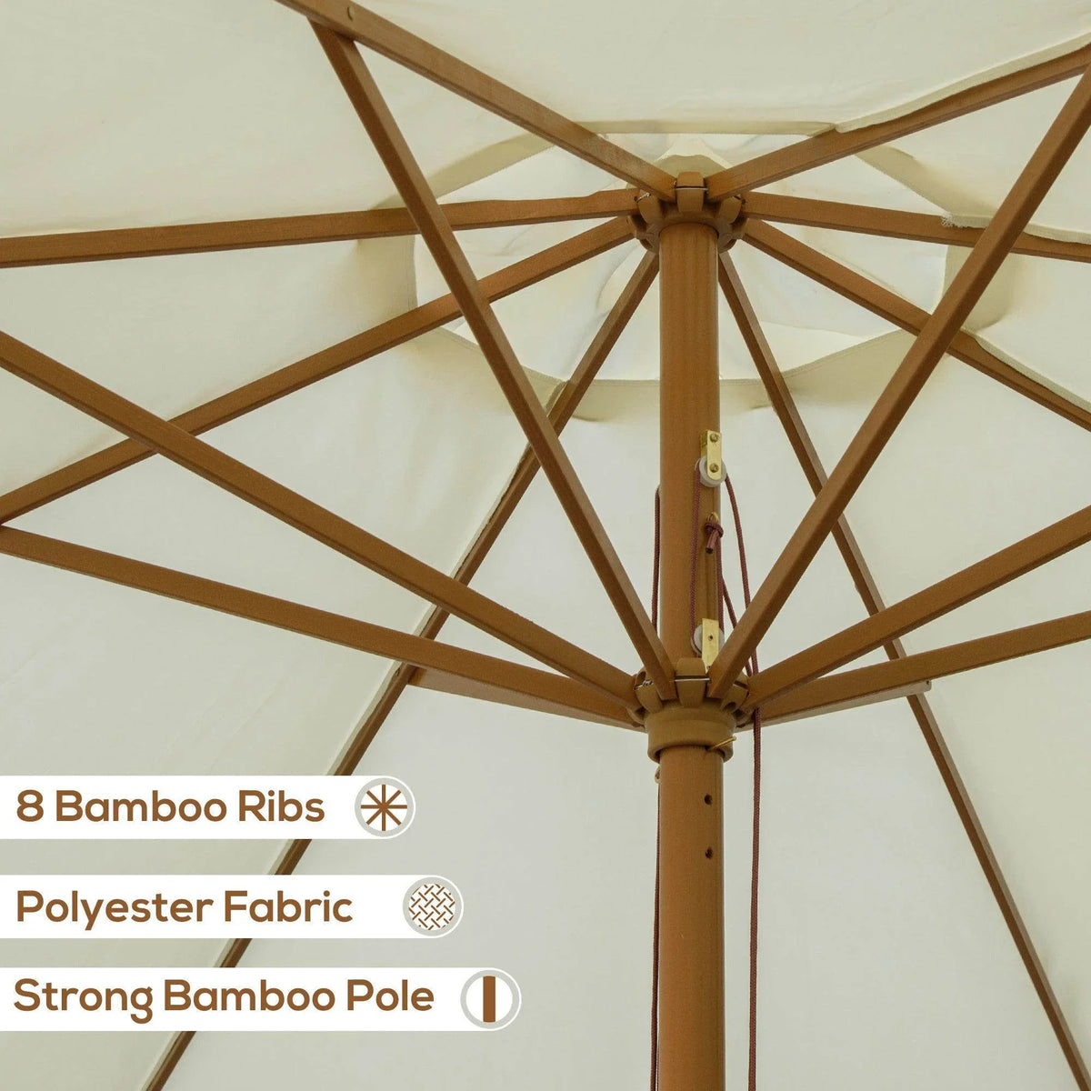 Beige patio umbrella underside showing bamboo ribs and strong bamboo center pole frame.