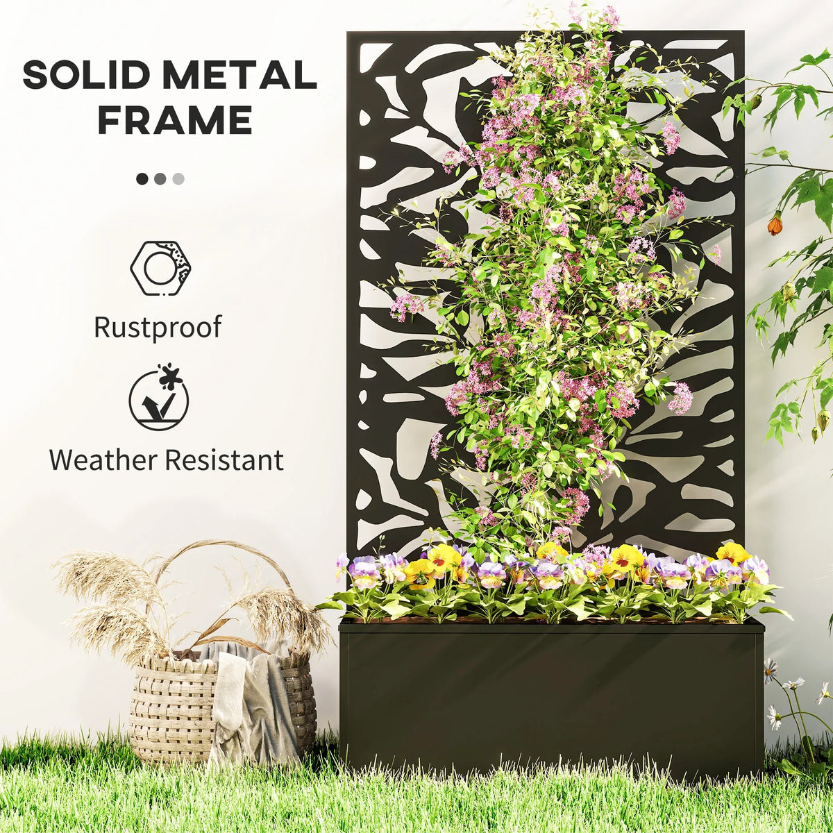 Black metal raised planter with solid frame and cutout trellis panel holding blooming flowers