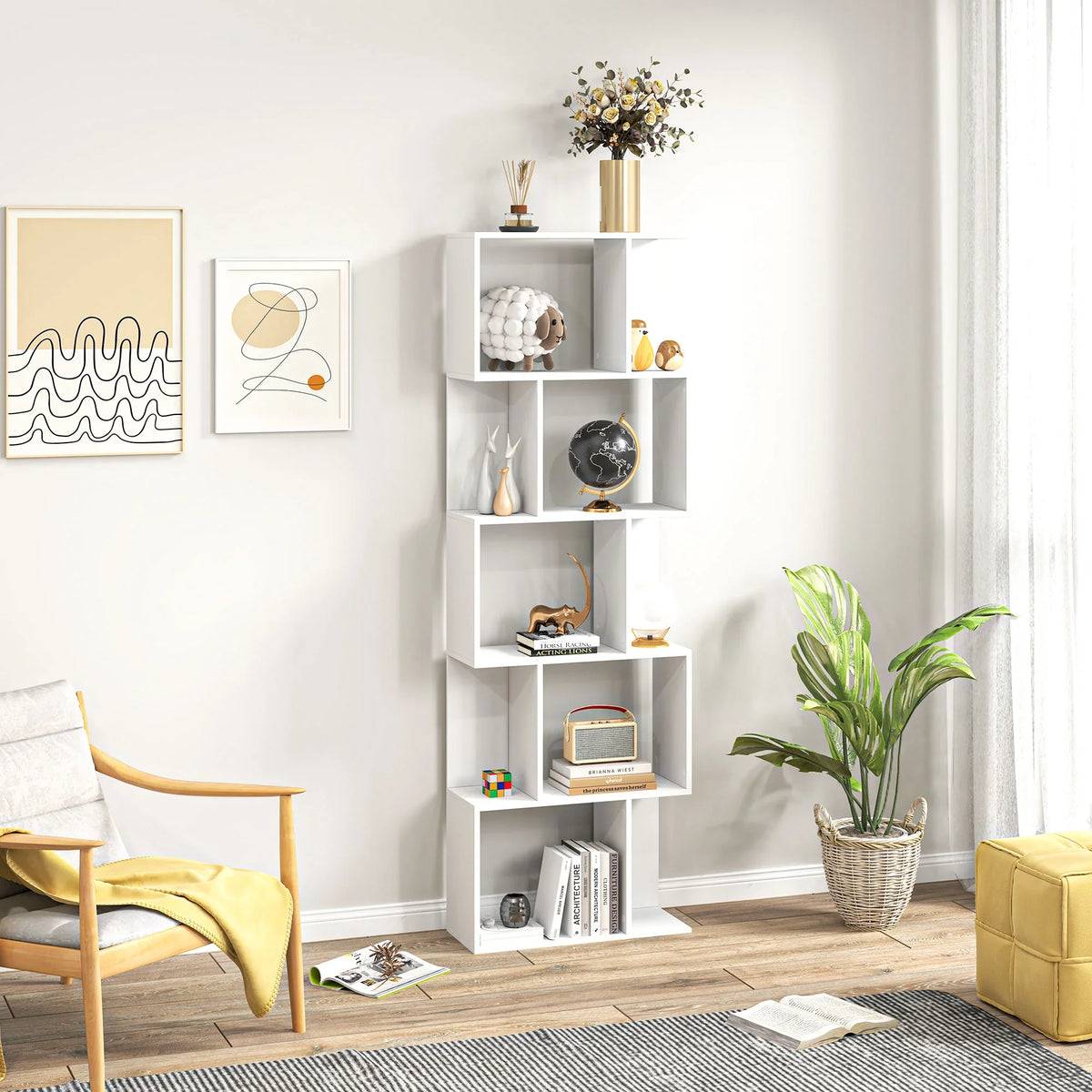 White five-tier open bookcase with decorative vases, books, and ornaments in cubbies.