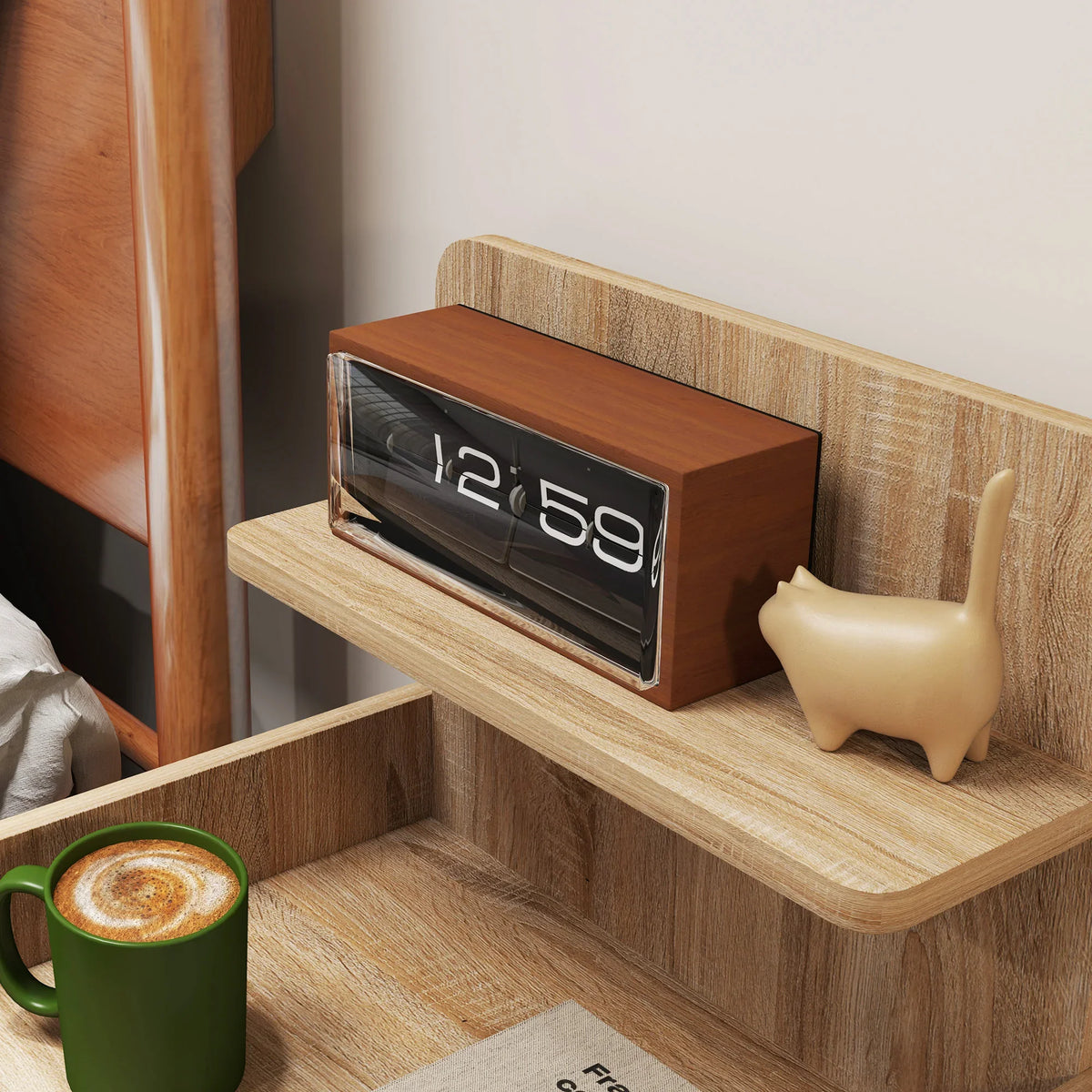Close-up corner view of wood-effect bedside table with top shelf, open cubby, and decor items.