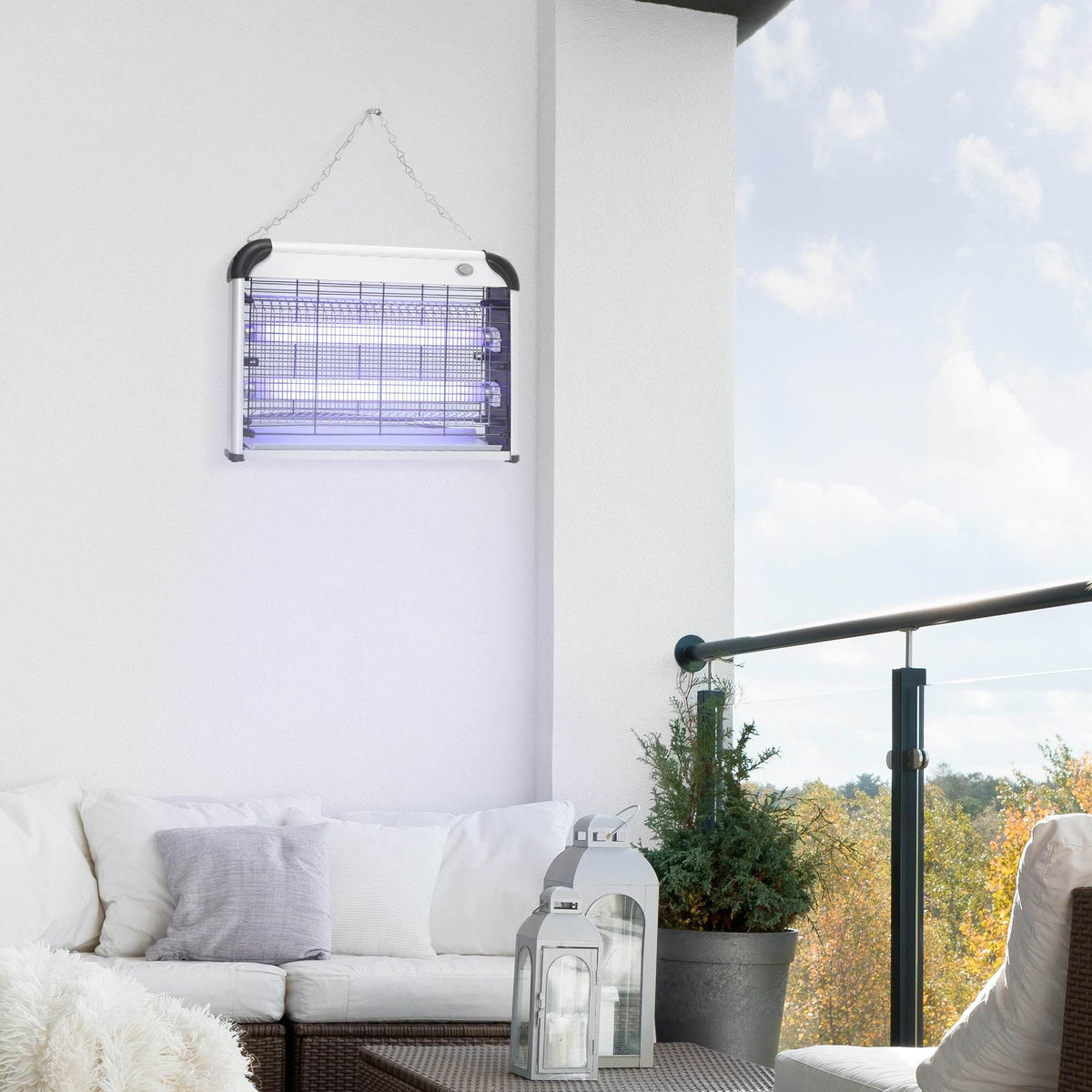 Wall-mounted electric fly zapper with hanging chain and UV grid housing, silver frame