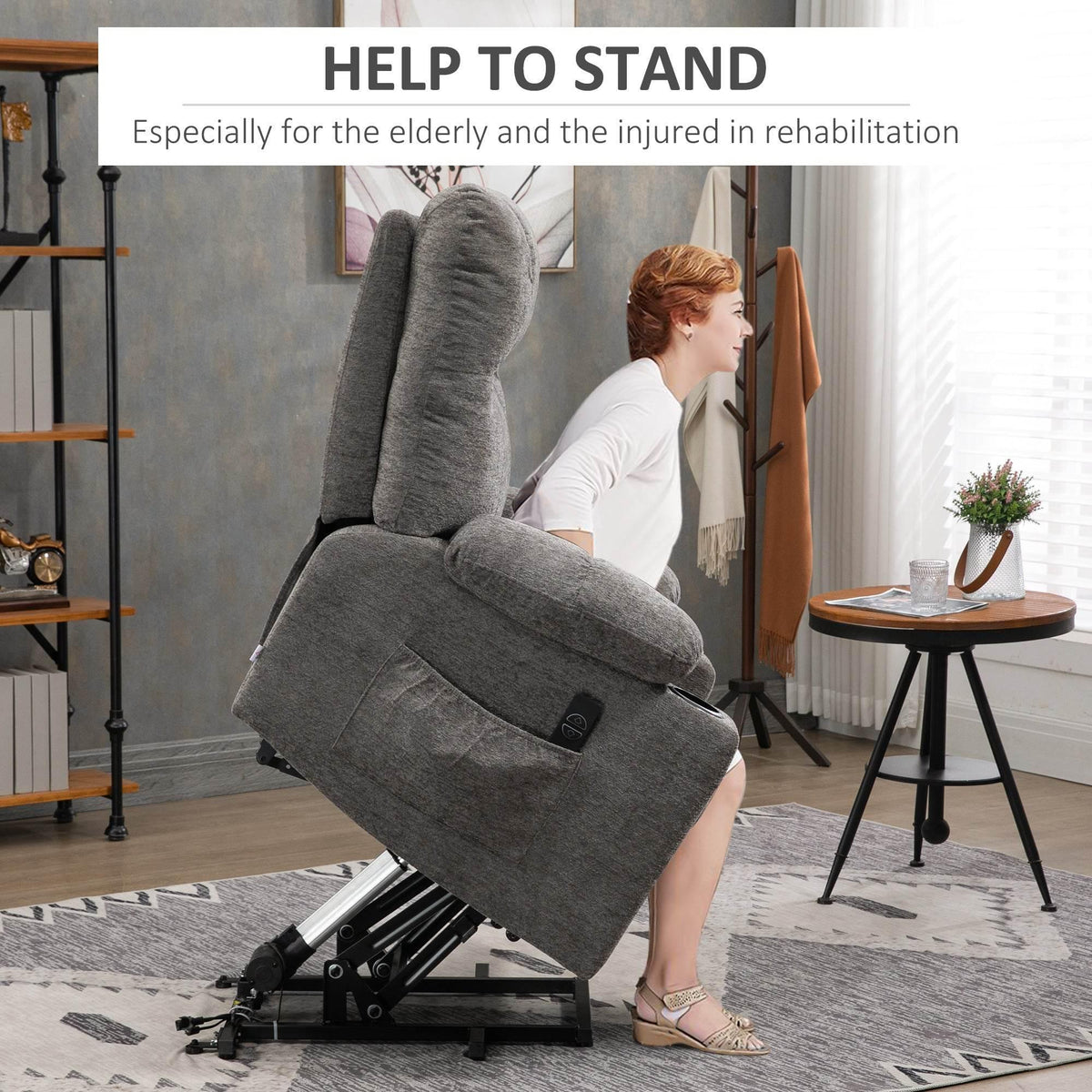 Grey velvet power lift recliner chair with footrest extended and tall headrest