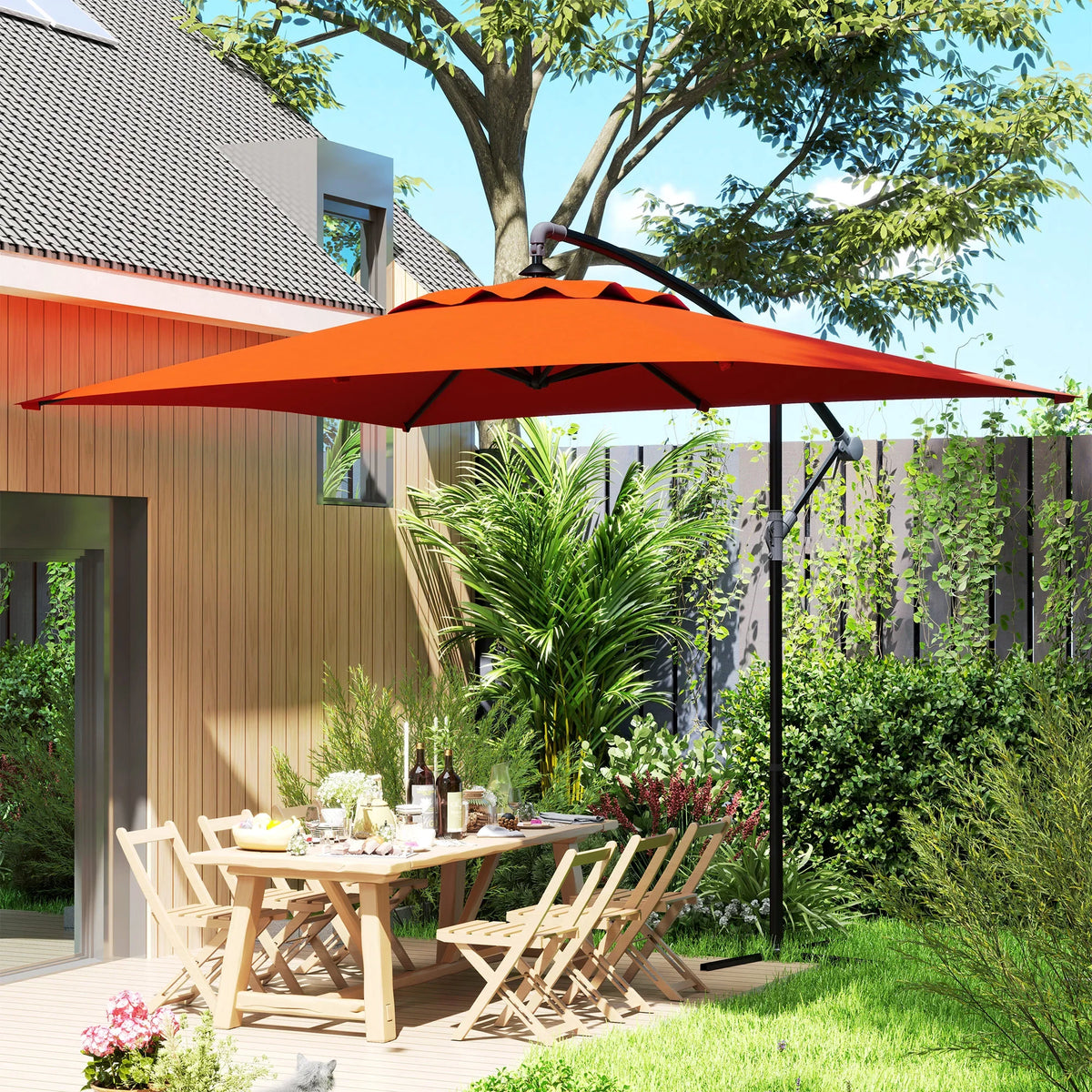 Orange cantilever patio parasol shading an outdoor dining table and chairs