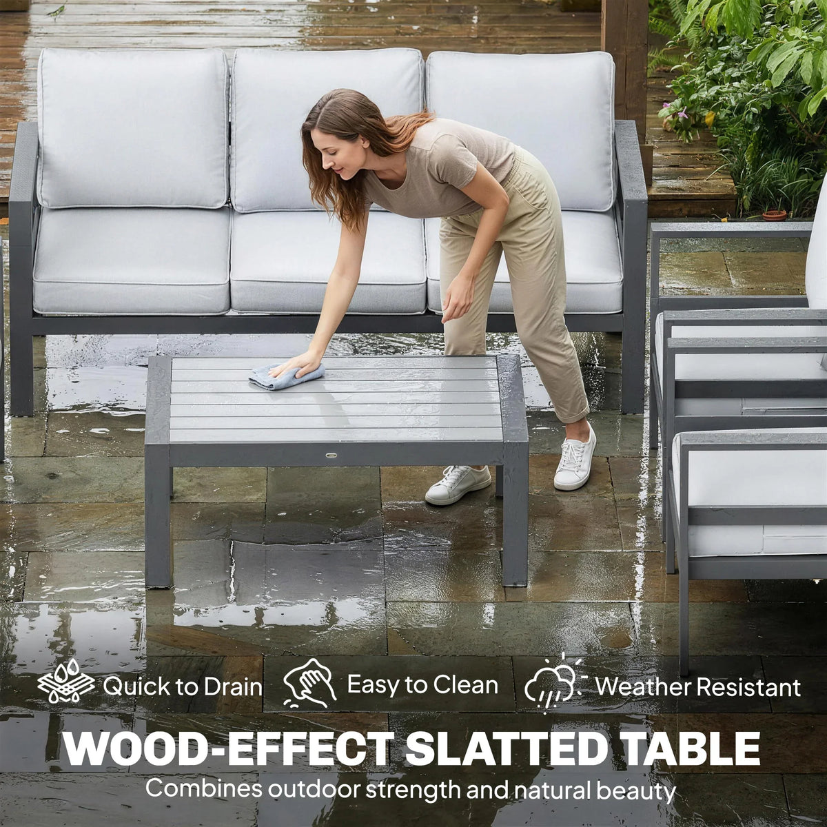 Wood-effect slatted coffee table with dark grey aluminium frame and light grey seat cushions