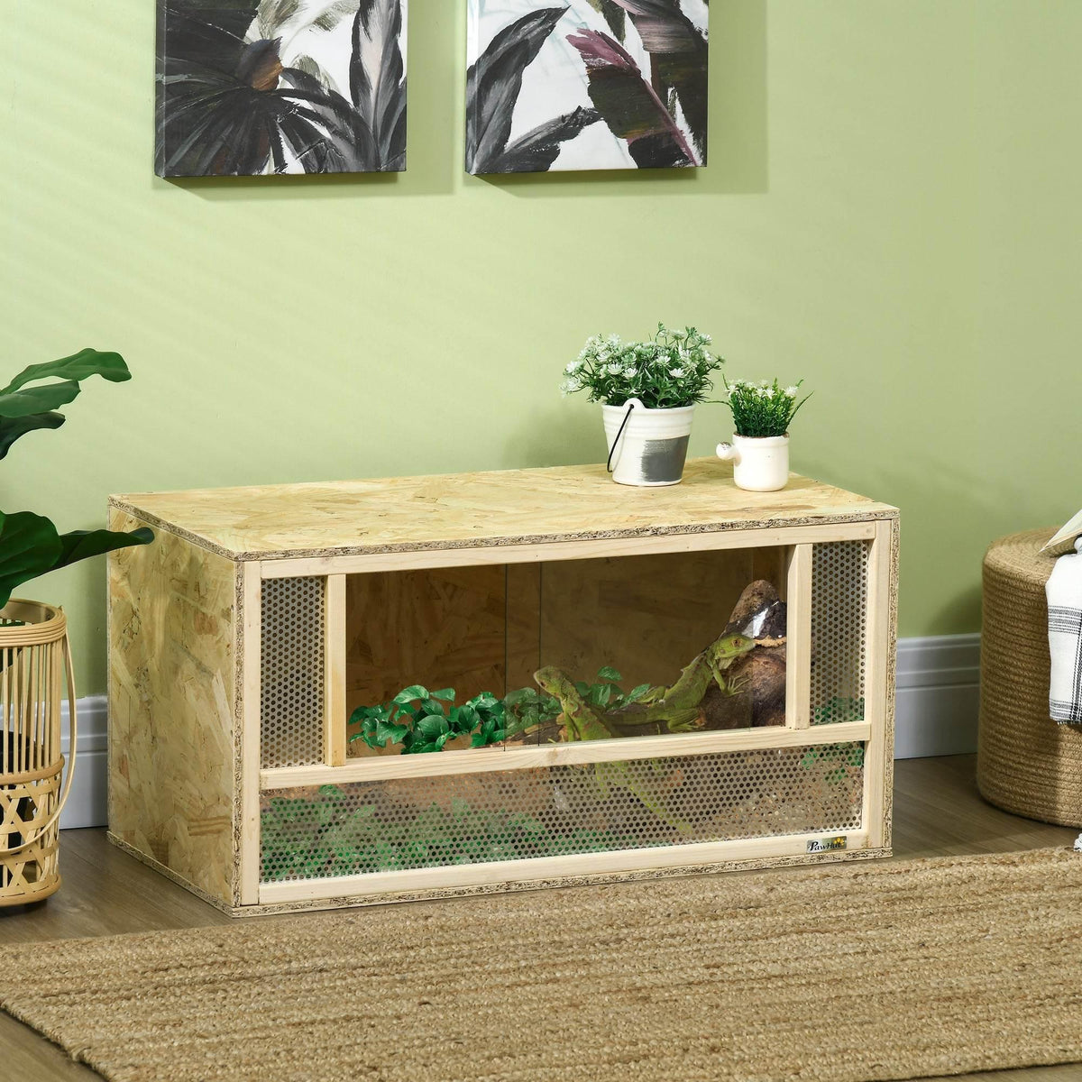 Wooden reptile habitat with side mesh vents and front glass window, open inside view