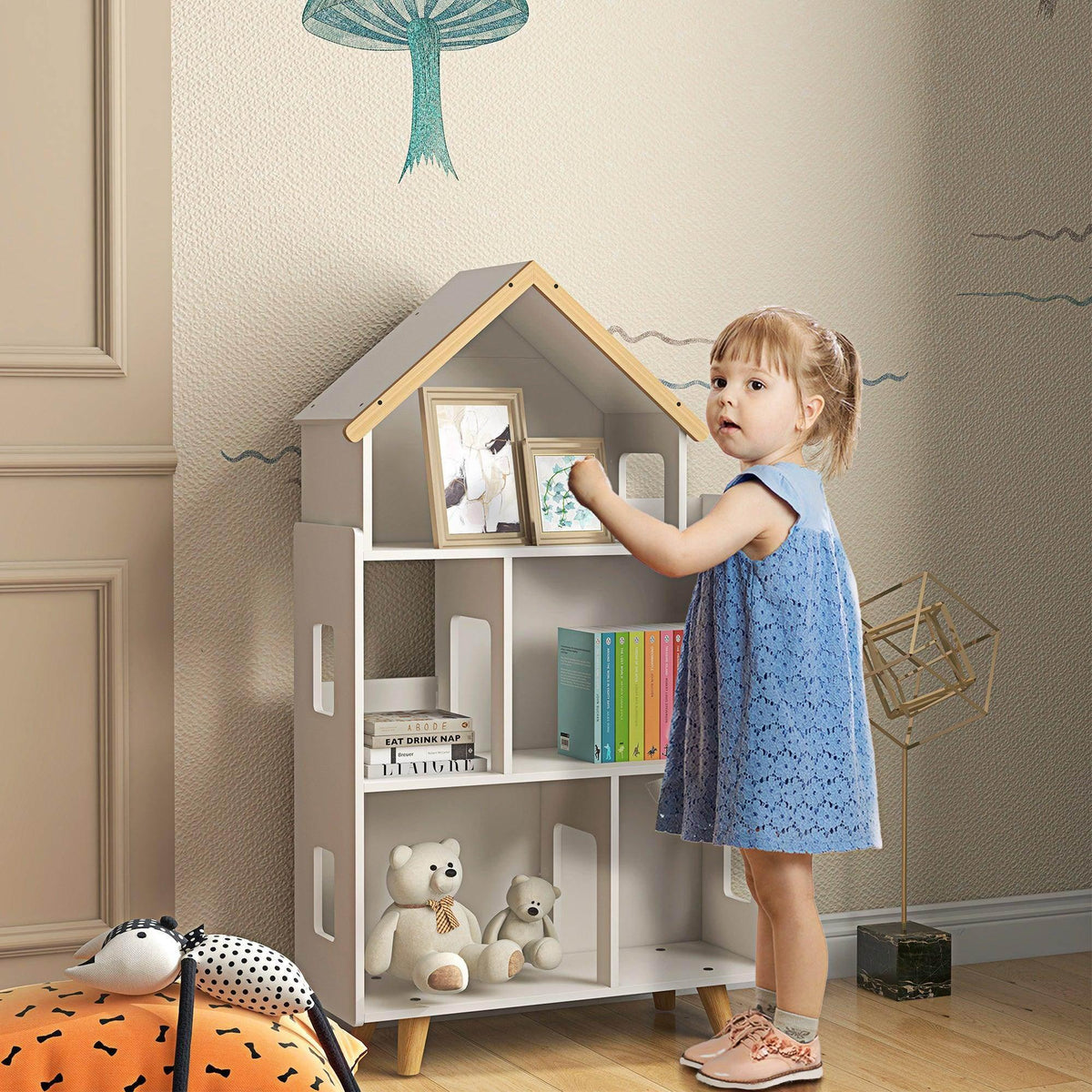 White 3-tier, house-shaped toy storage shelf with 6 cubbies and side handles