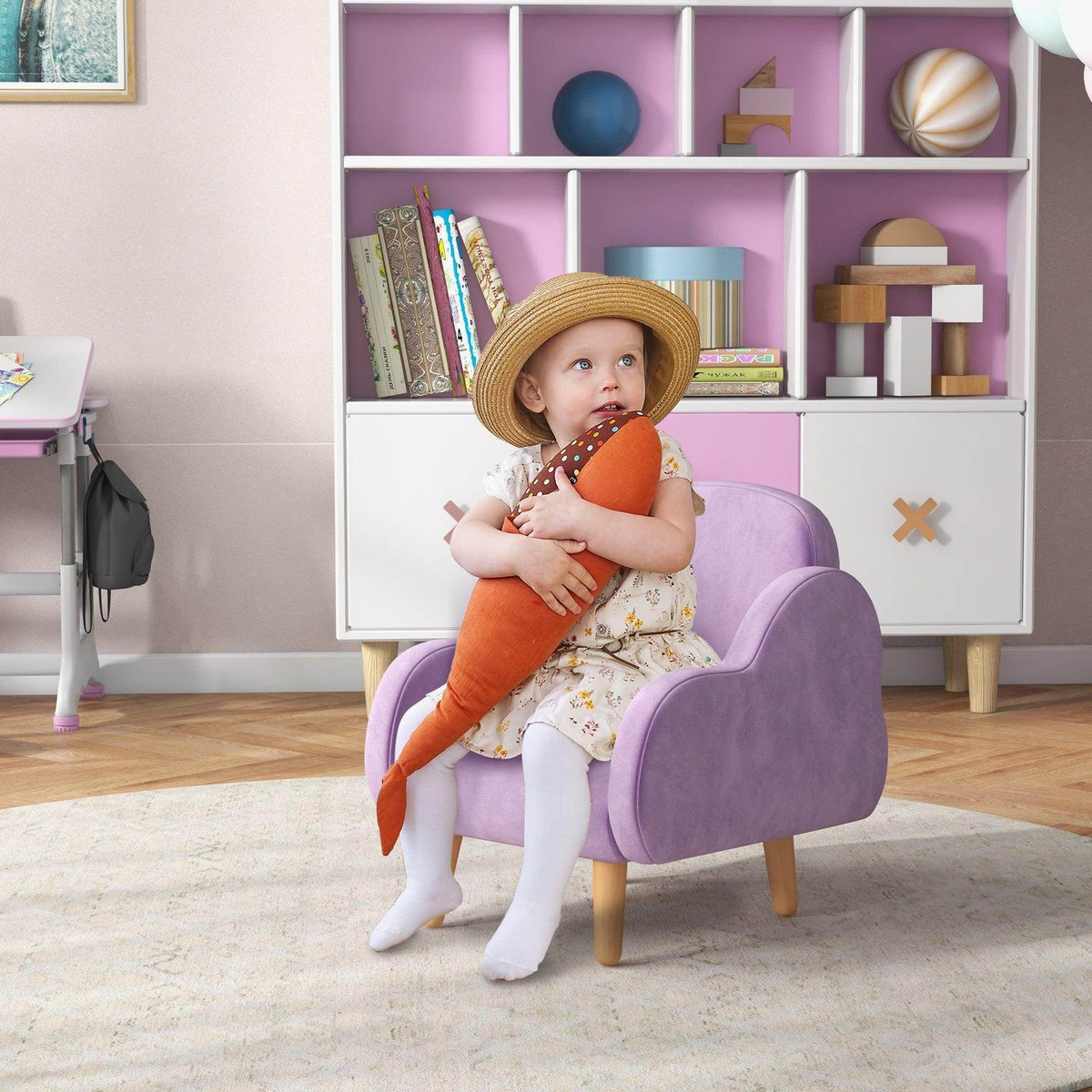Purple cloud-shaped toddler armchair with rounded arms and plush seat