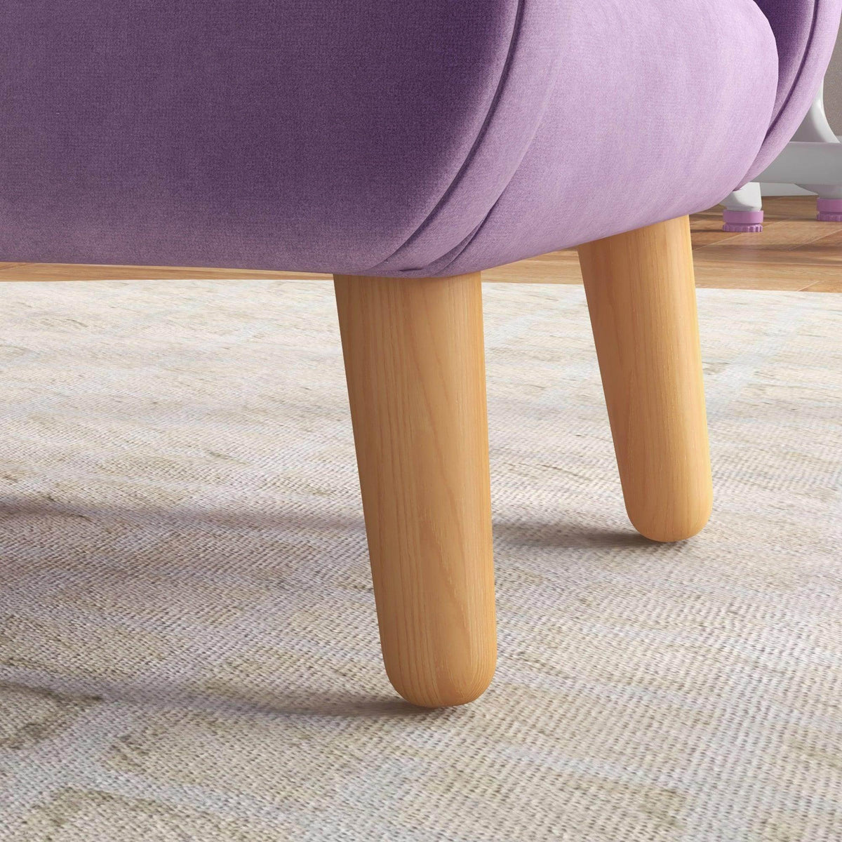 Purple plush toddler armchair with thick rounded armrest and light wood feet