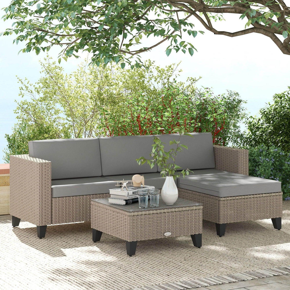 5-piece rattan patio furniture set with corner sofa, ottomans, and square coffee table
