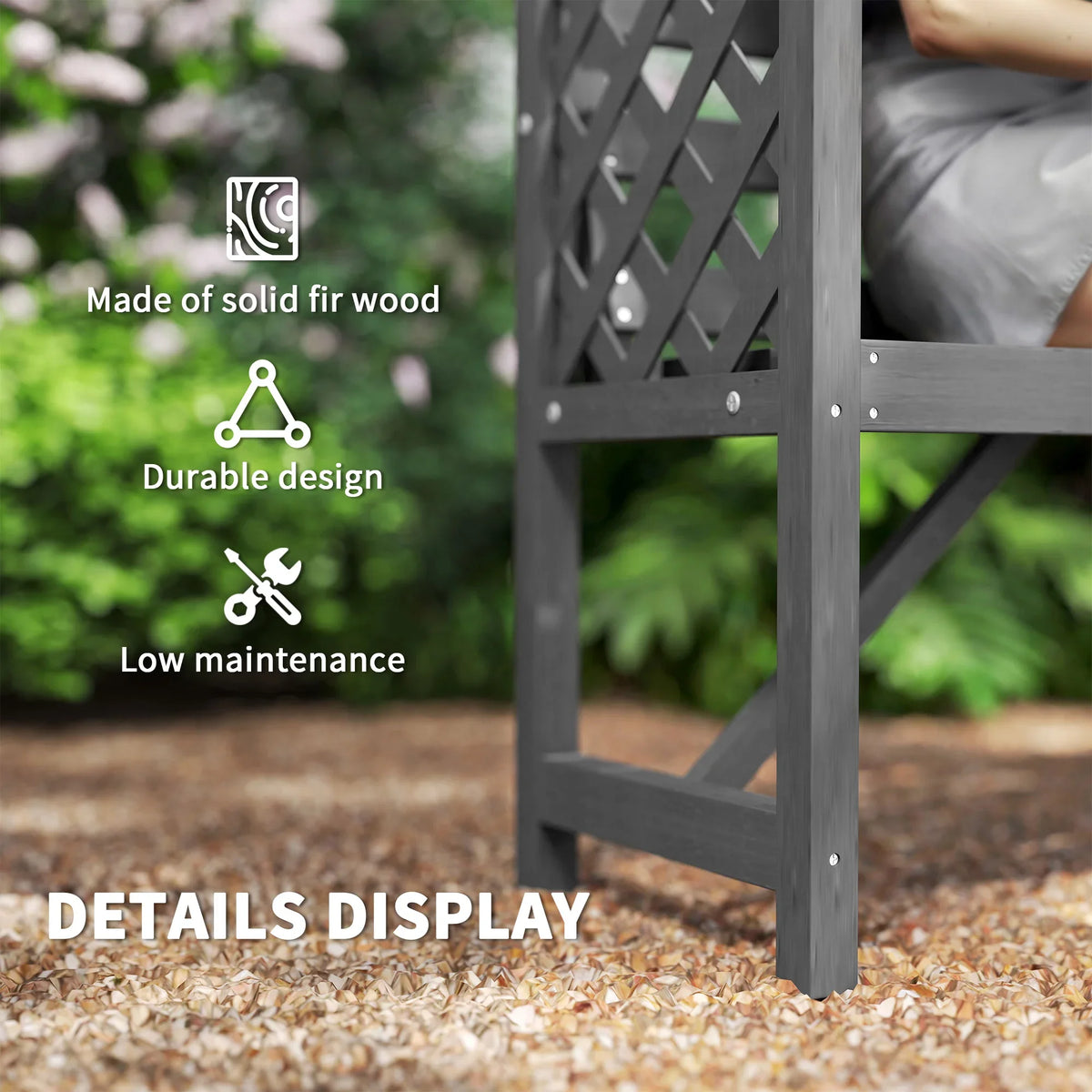 Close-up of grey wooden arbour bench trellis panel and sturdy leg base on gravel.