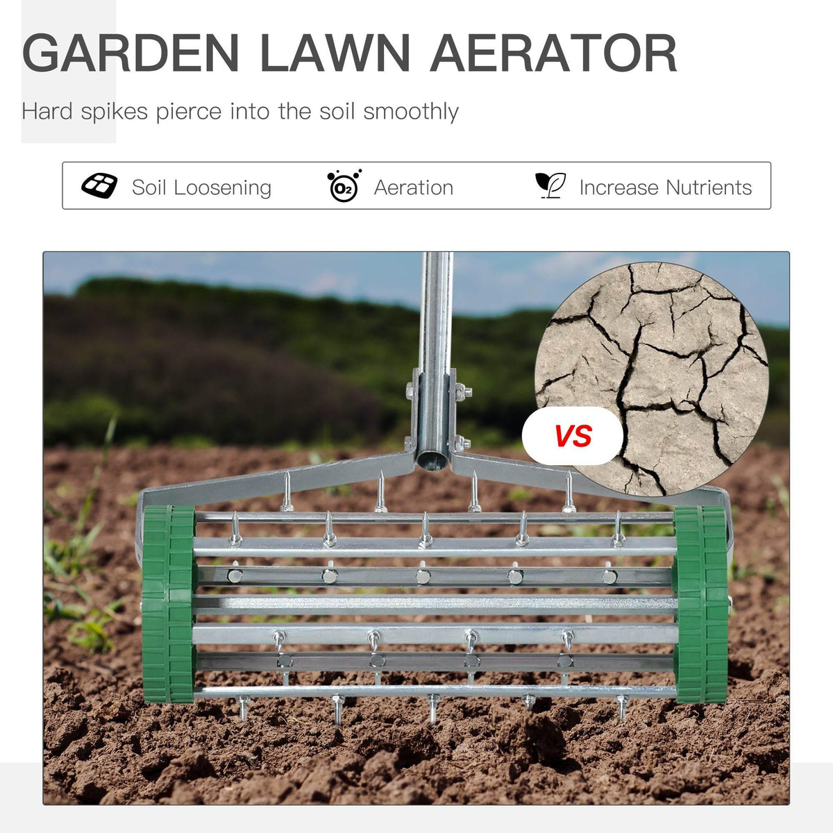 Green lawn aerator roller with metal spikes and upright handle for aerating soil