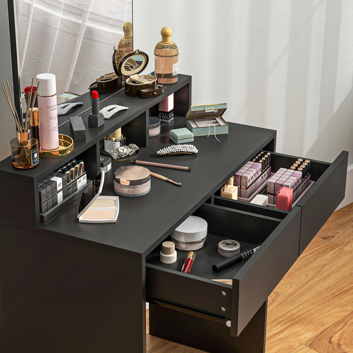 Black vanity dressing table with open drawers and compartments for cosmetics and jewelry