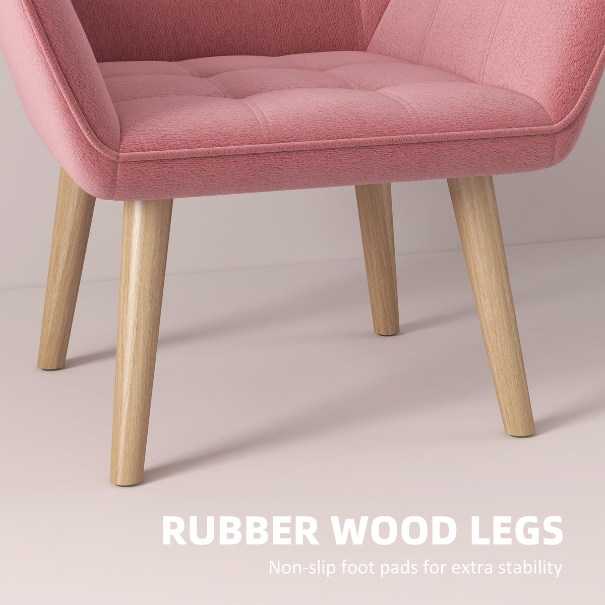 Pink upholstered accent arm chair seat with thick padding and light rubber-wood legs