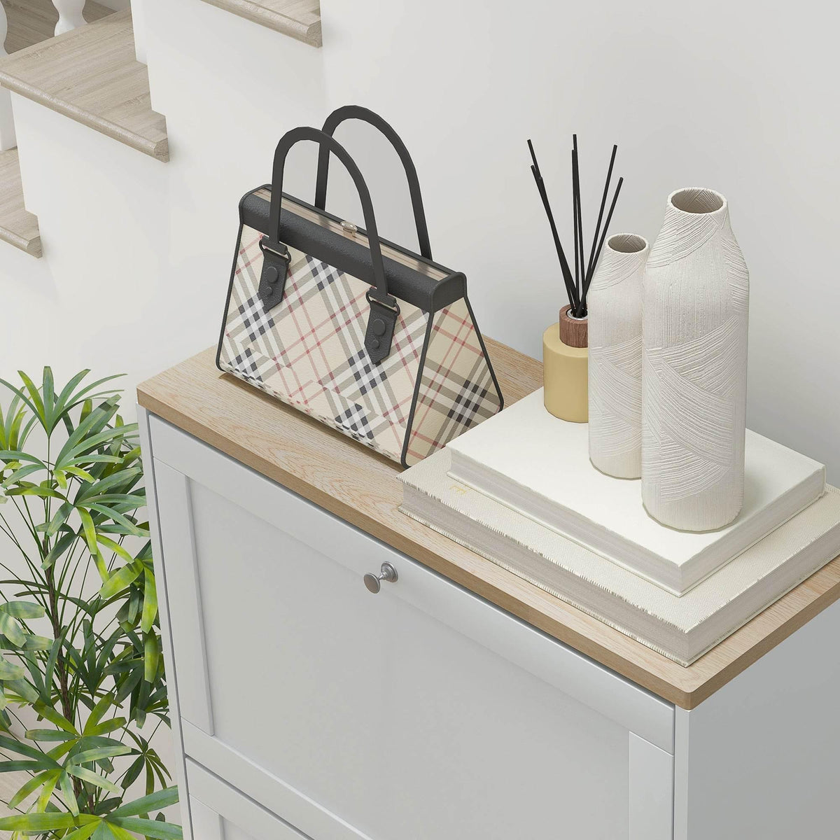 White shoe cabinet with wooden top and three flip drawers for hallway storage