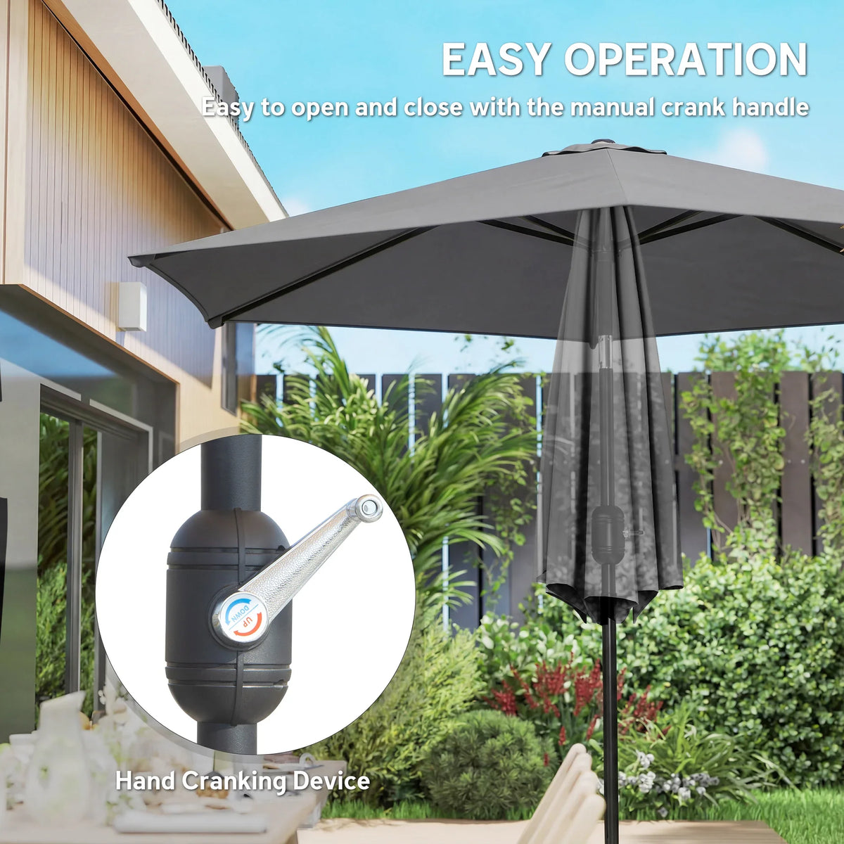 Grey patio parasol with manual crank mechanism and open canopy