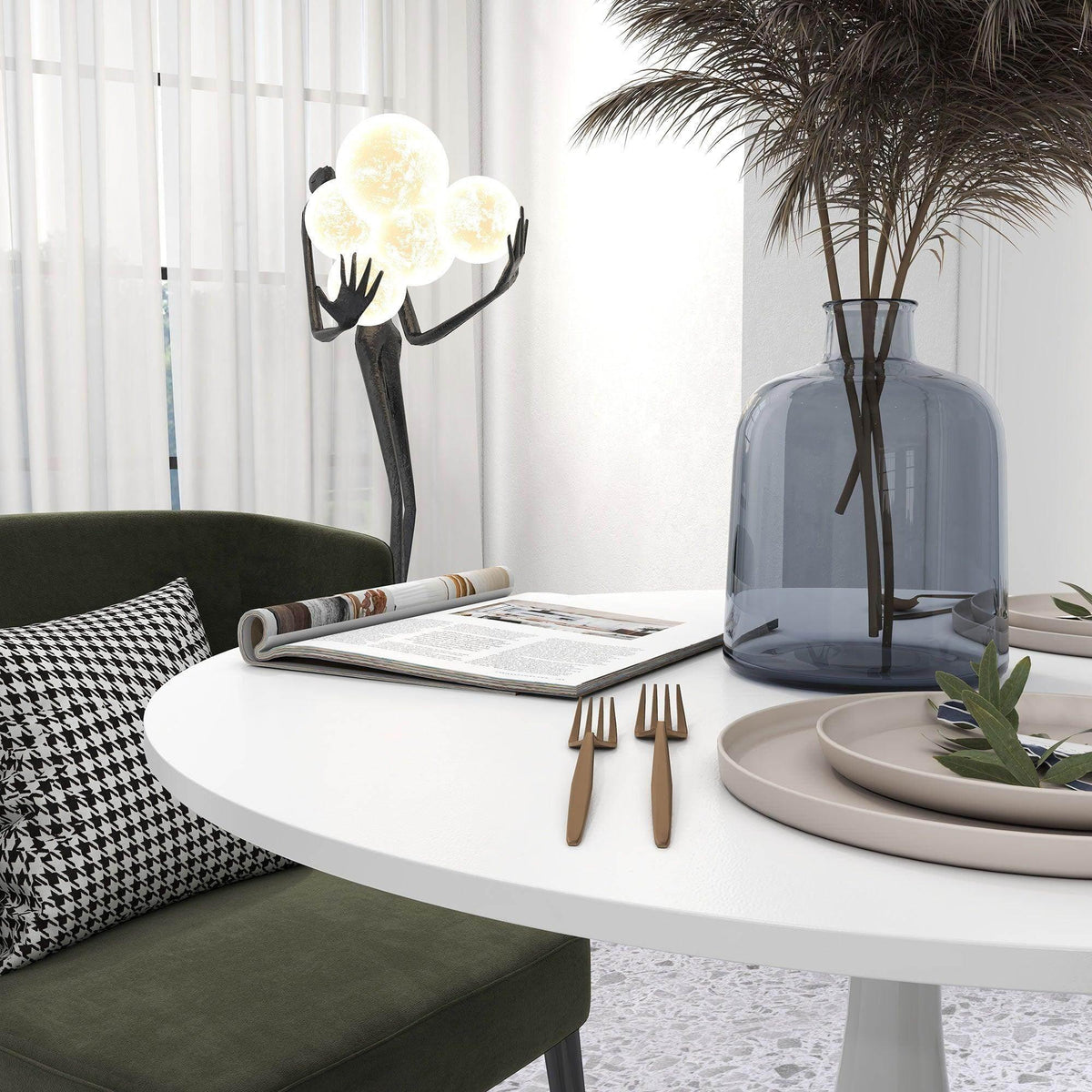 White round pedestal dining table with place setting centerpiece