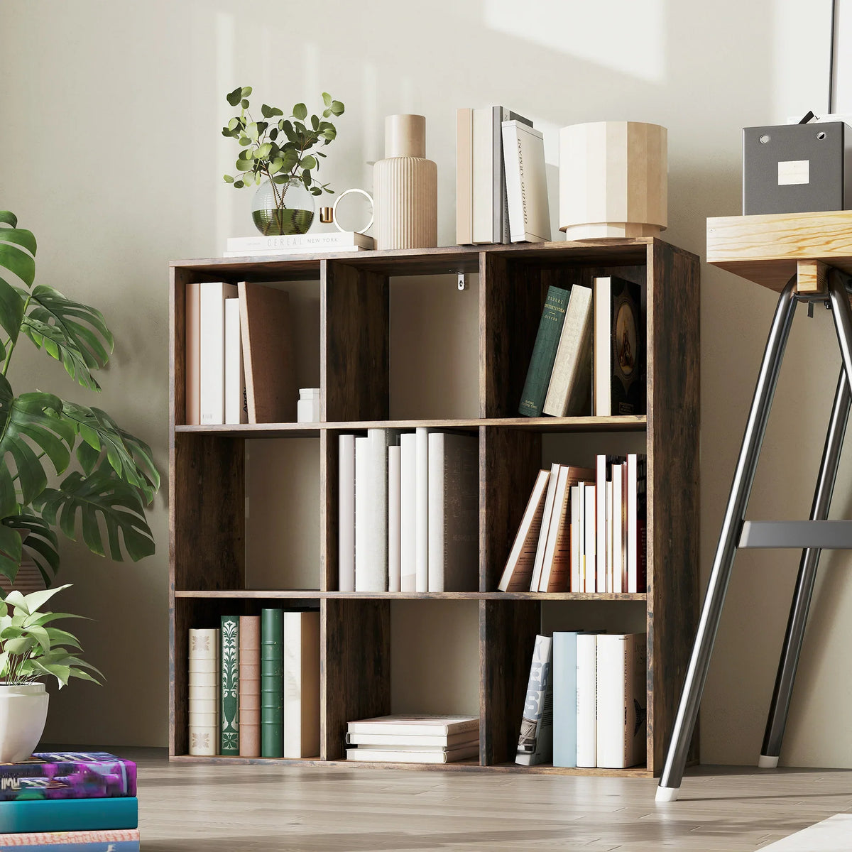 Rustic brown 9-cube storage shelf with open cubbies and books