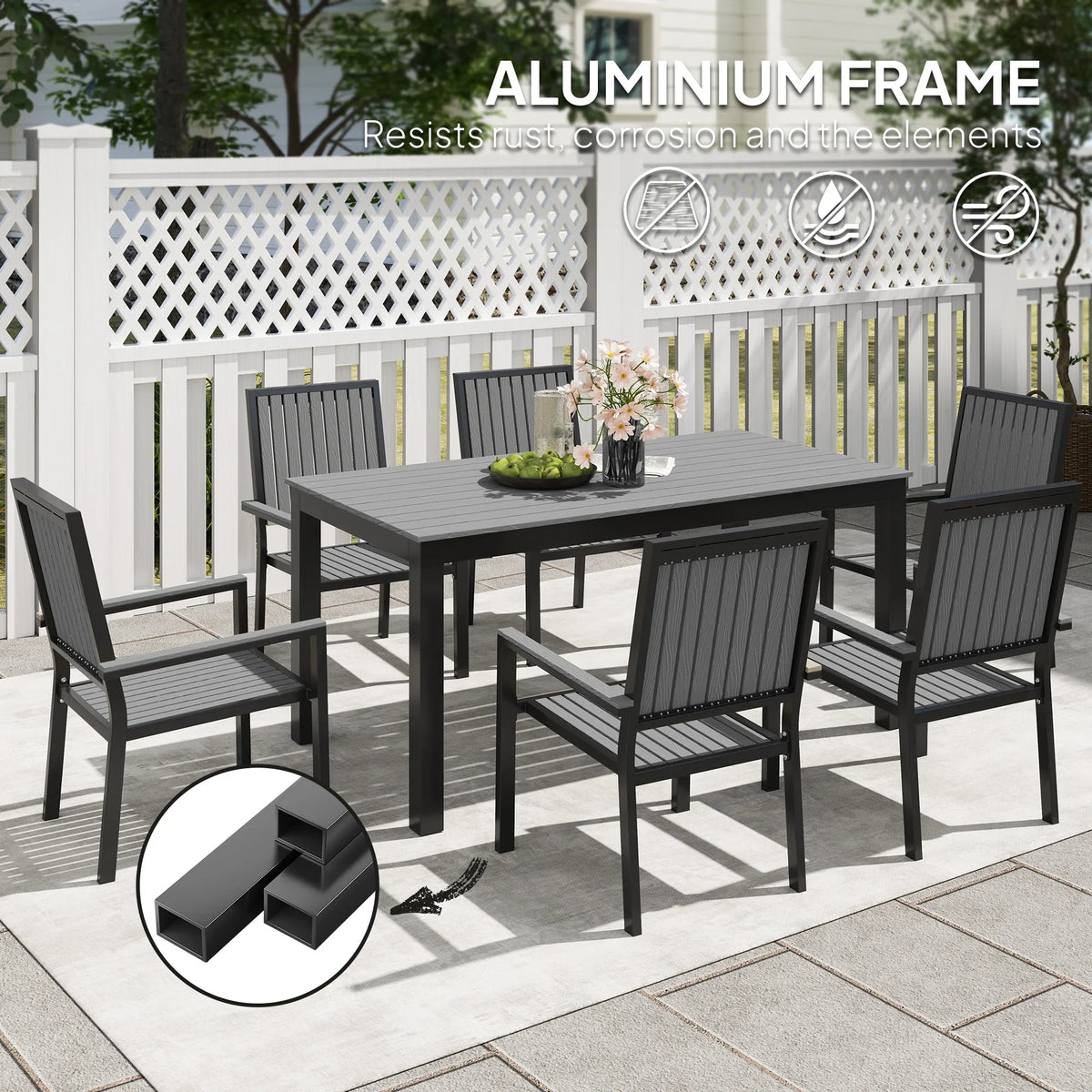 Grey aluminium outdoor dining set with rectangular table and 6 ribbed-back chairs