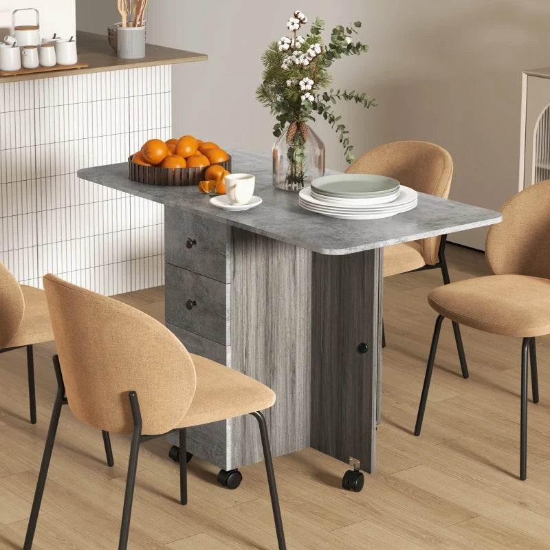 Foldable dining table with drop-leaf top, grey woodgrain, drawers and storage cabinet on wheels
