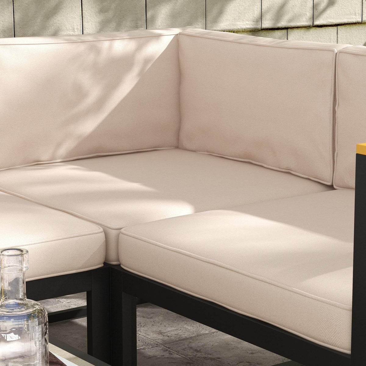 Beige patio sectional cushion set with seat and back pads and corner support