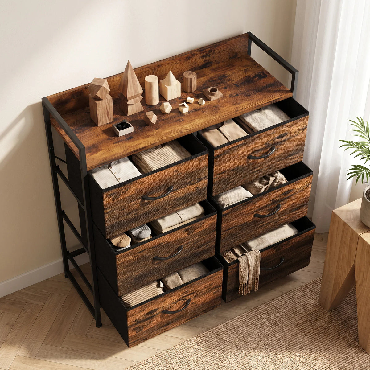 Folding fabric drawer chest with rustic brown top, three-tier open sections, and curved pull handles