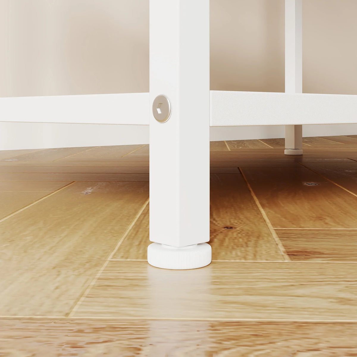 White shelving unit base with adjustable foot pad, freestanding design