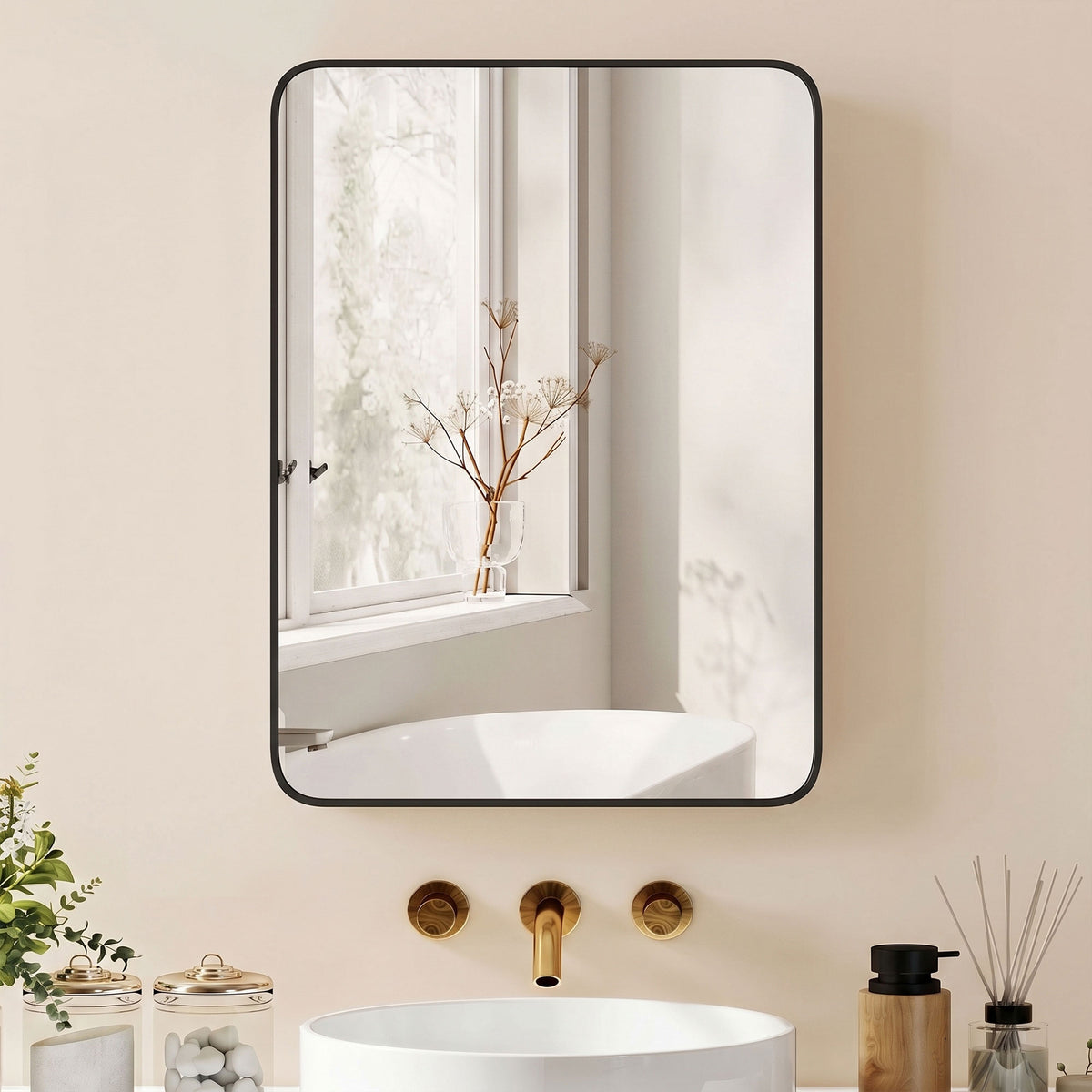 Black-framed bathroom mirror cabinet mounted on wall, reflecting a bathtub scene