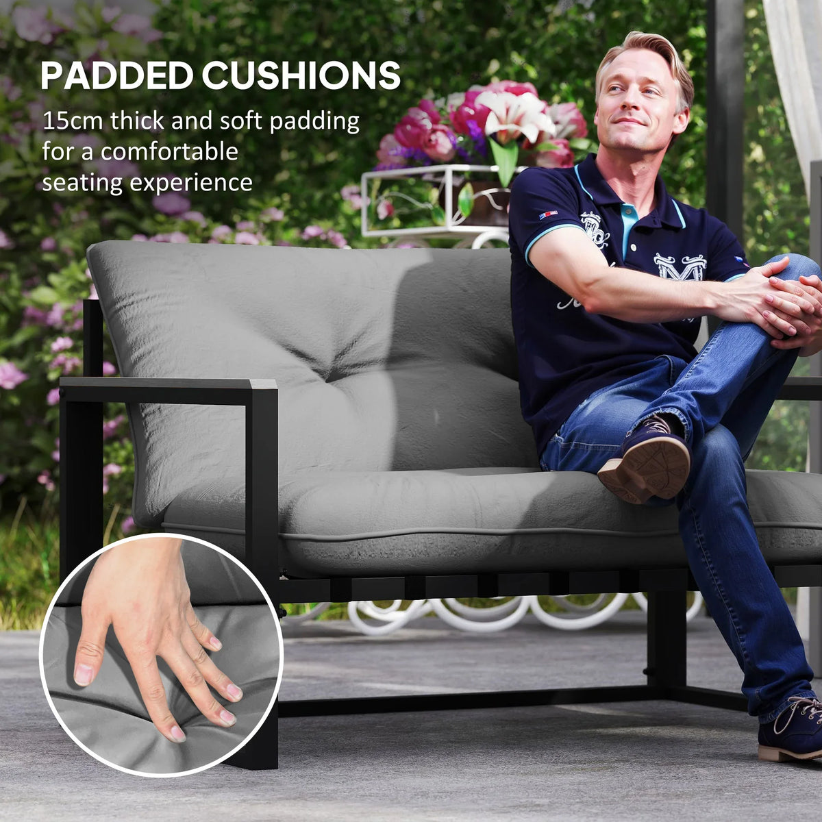 Dark grey padded loveseat cushions with comfortable seat padding on a sturdy metal frame.