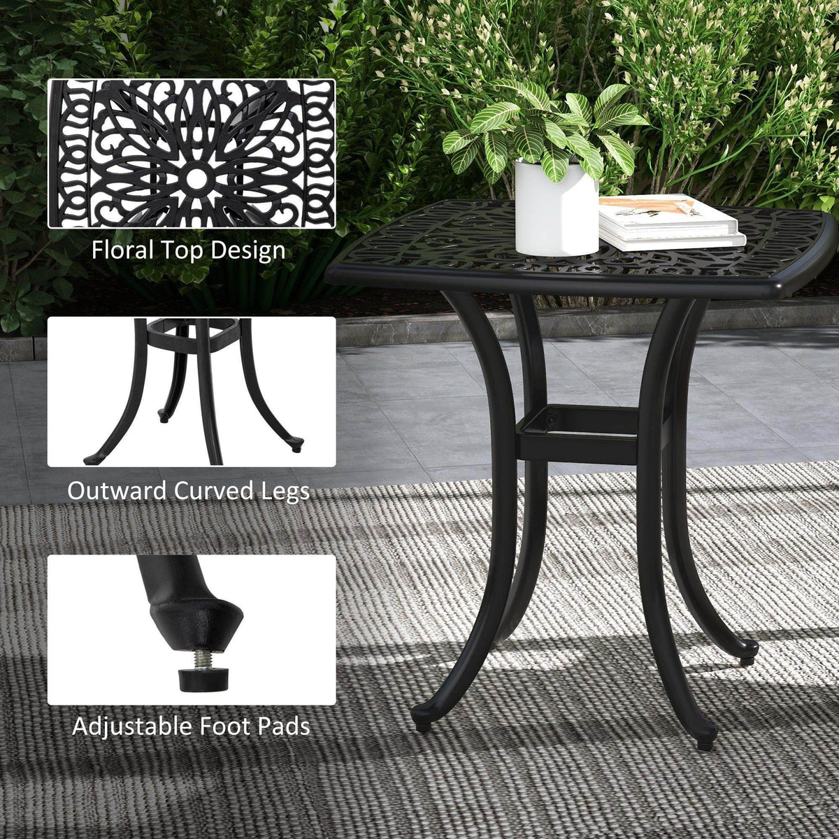 Black outdoor bistro table with floral lattice top, outward-curved legs, adjustable foot pads