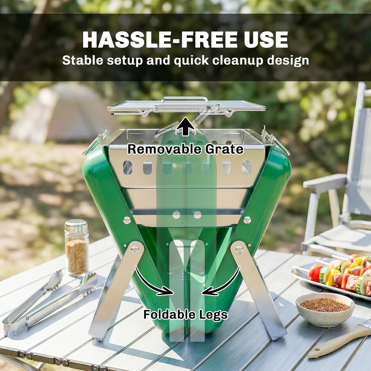 Green portable charcoal grill front view with open grate and fold-out legs on table
