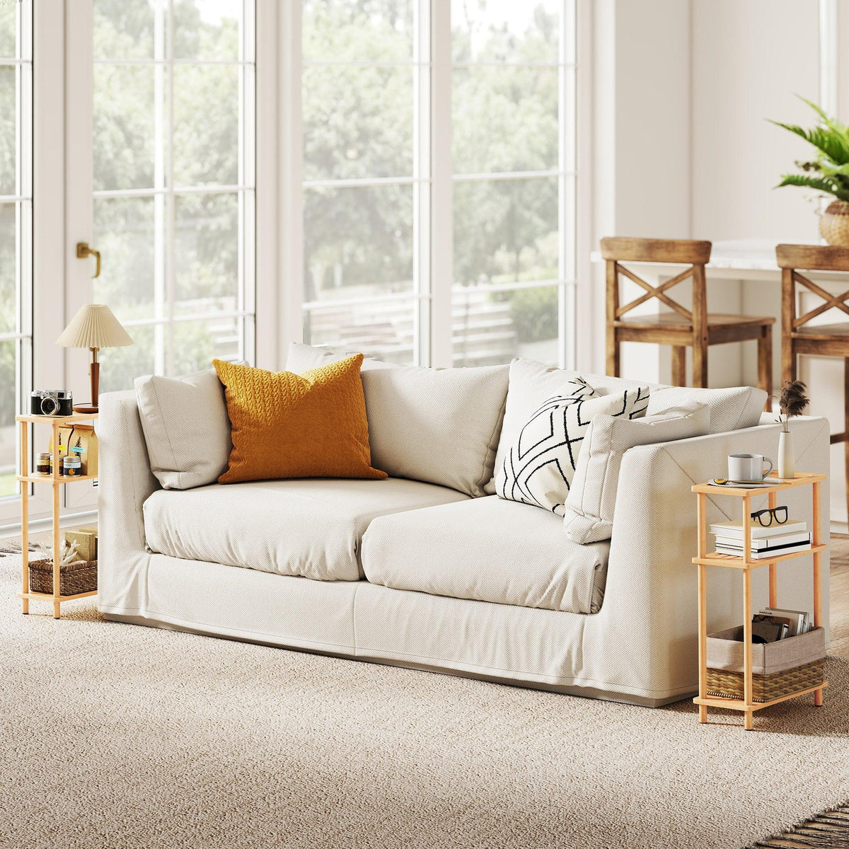 Natural bamboo 3-tier end table with open shelves next to sofa