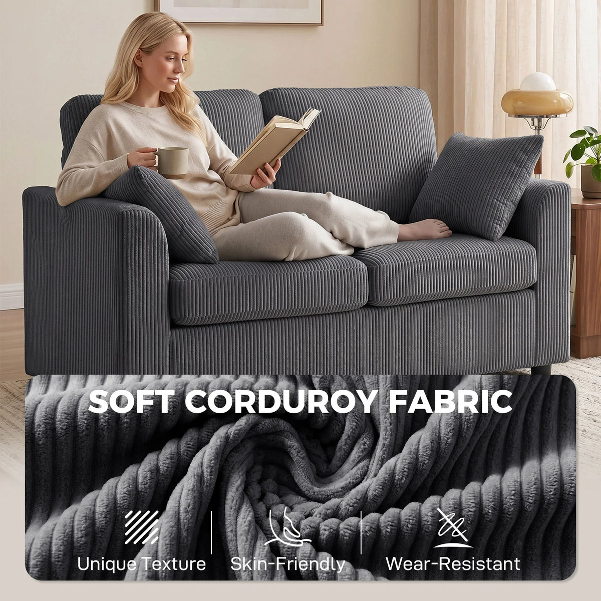 Dark grey corduroy 2-seat sofa with thick seat cushions and textured upholstery