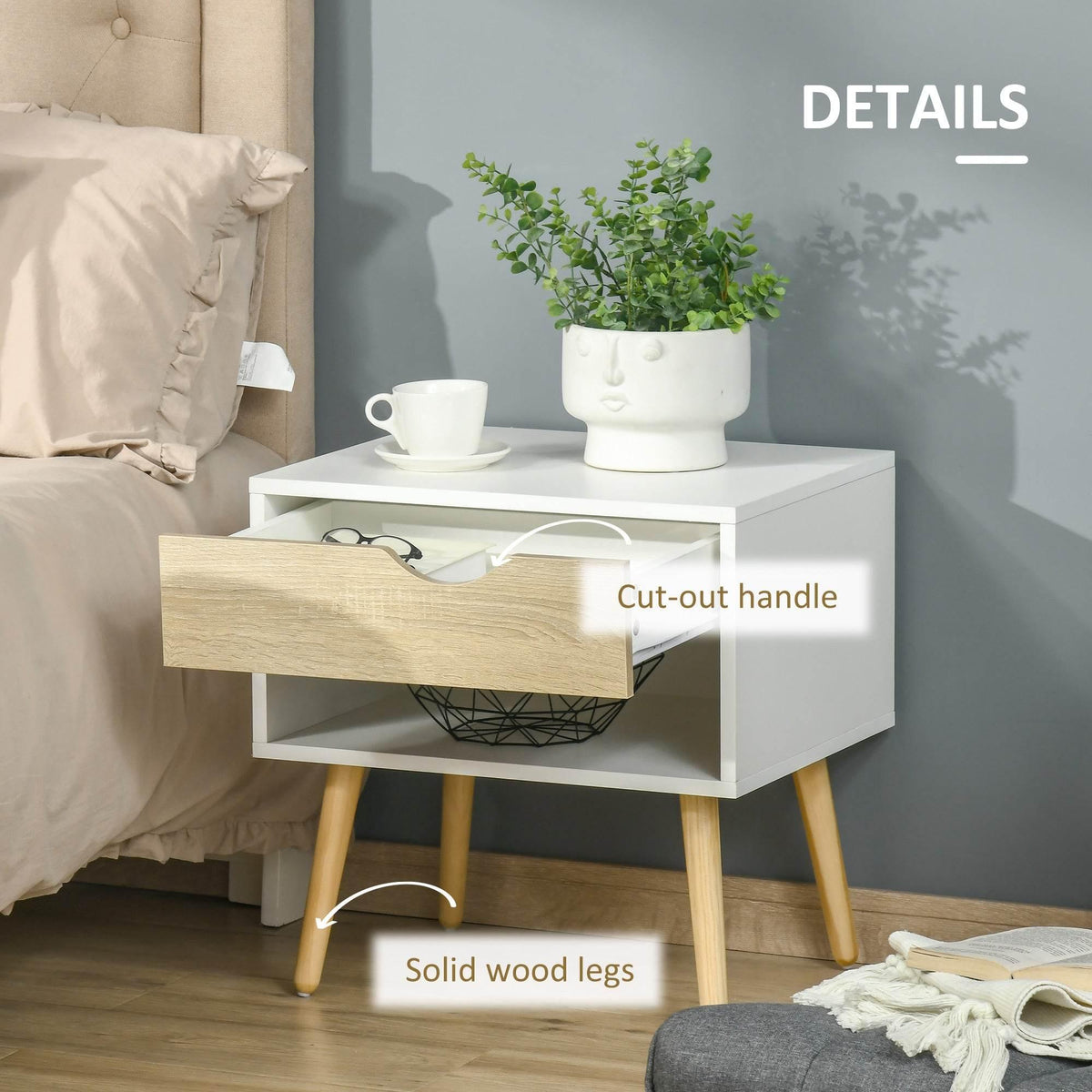 White bedside table with cut-out drawer handle and solid wood legs