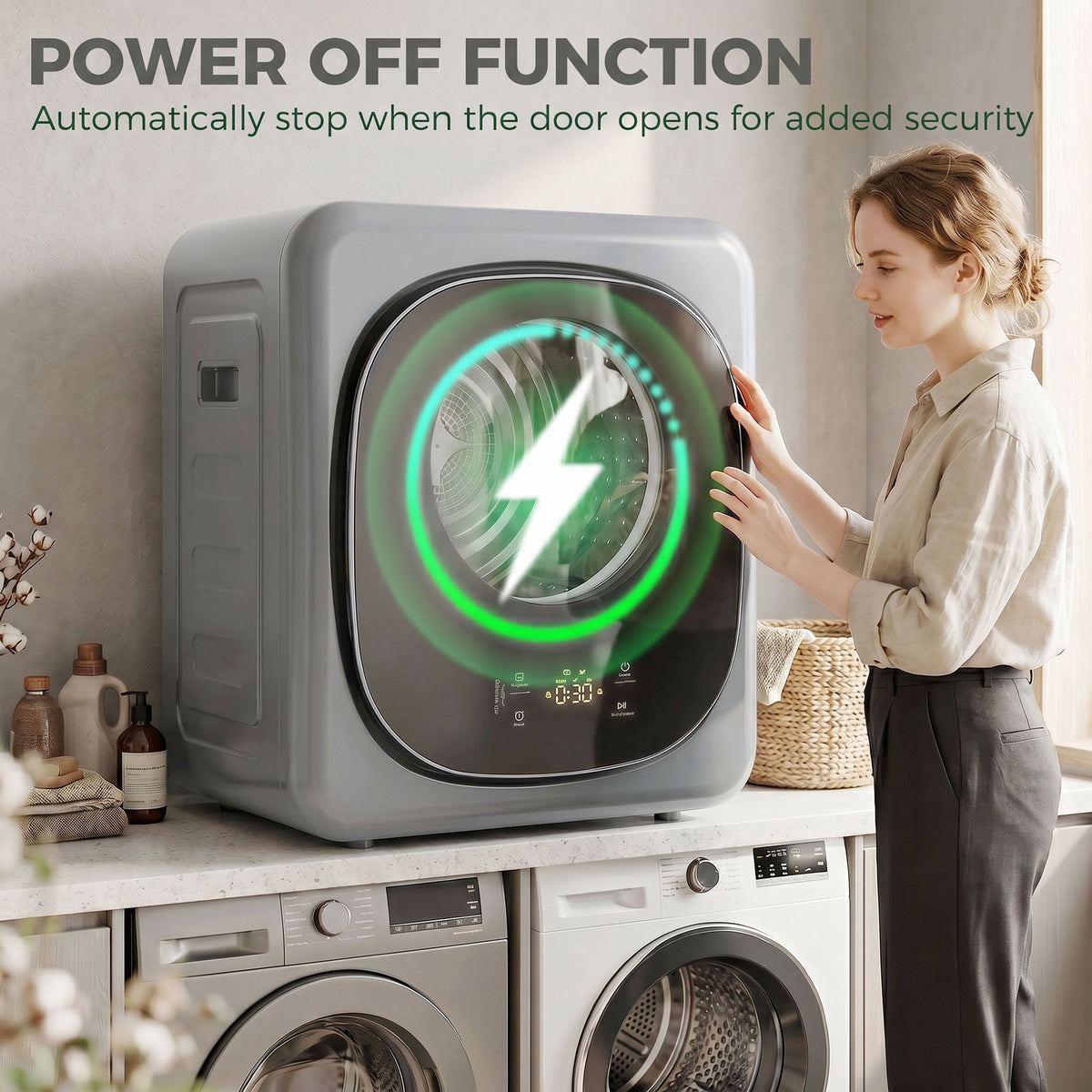 Silver front tumble dryer with illuminated drum window and side door panel