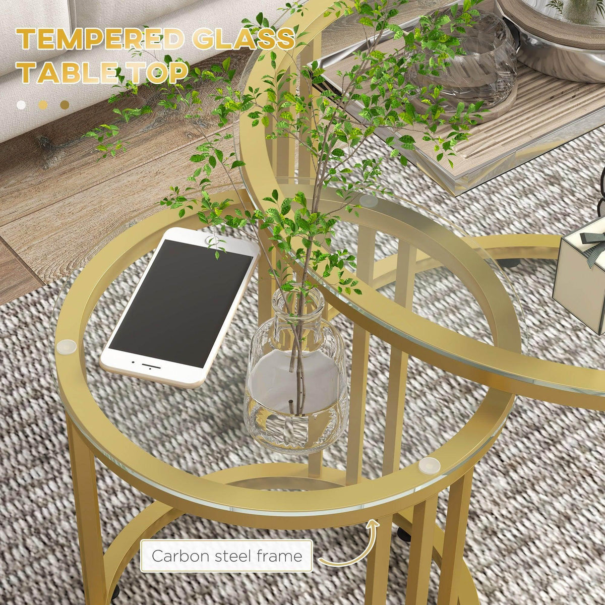 Gold steel coffee table with tempered glass top and curved open frame