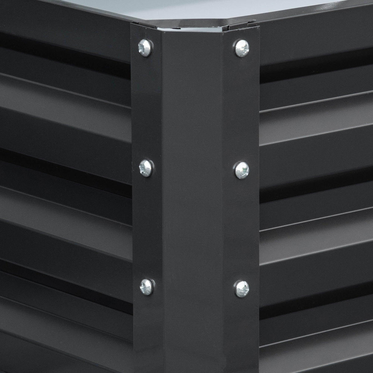 Grey raised garden bed corner post with metal bolts and slatted wall panels