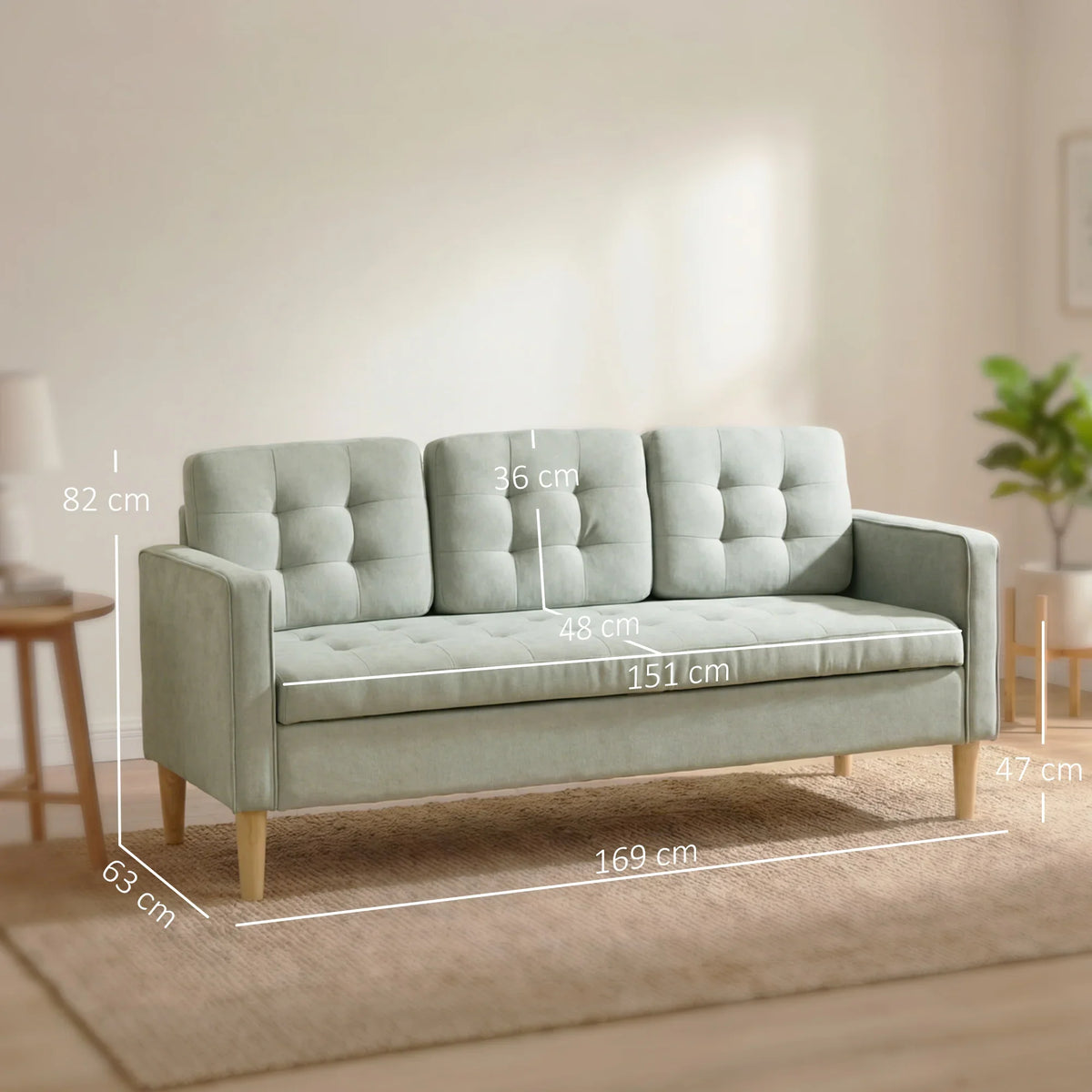 Light grey 3-seater sofa with tufted seat and back cushions, set on wooden legs