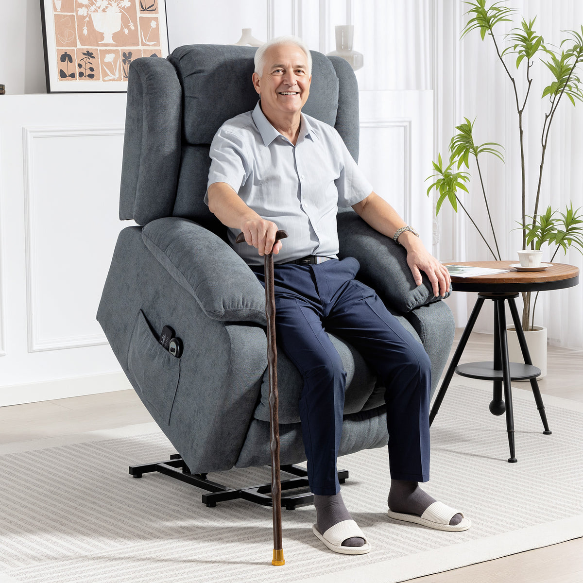 Grey power lift recliner chair with tall back, extended footrest, side pocket