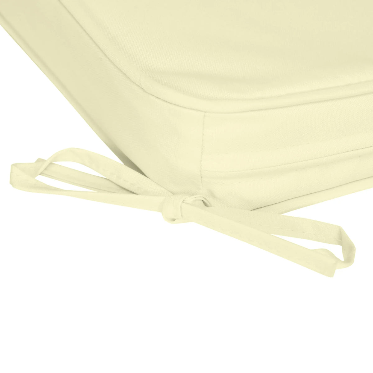 Close-up cream seat cushion showing stitched piping and long tie strings