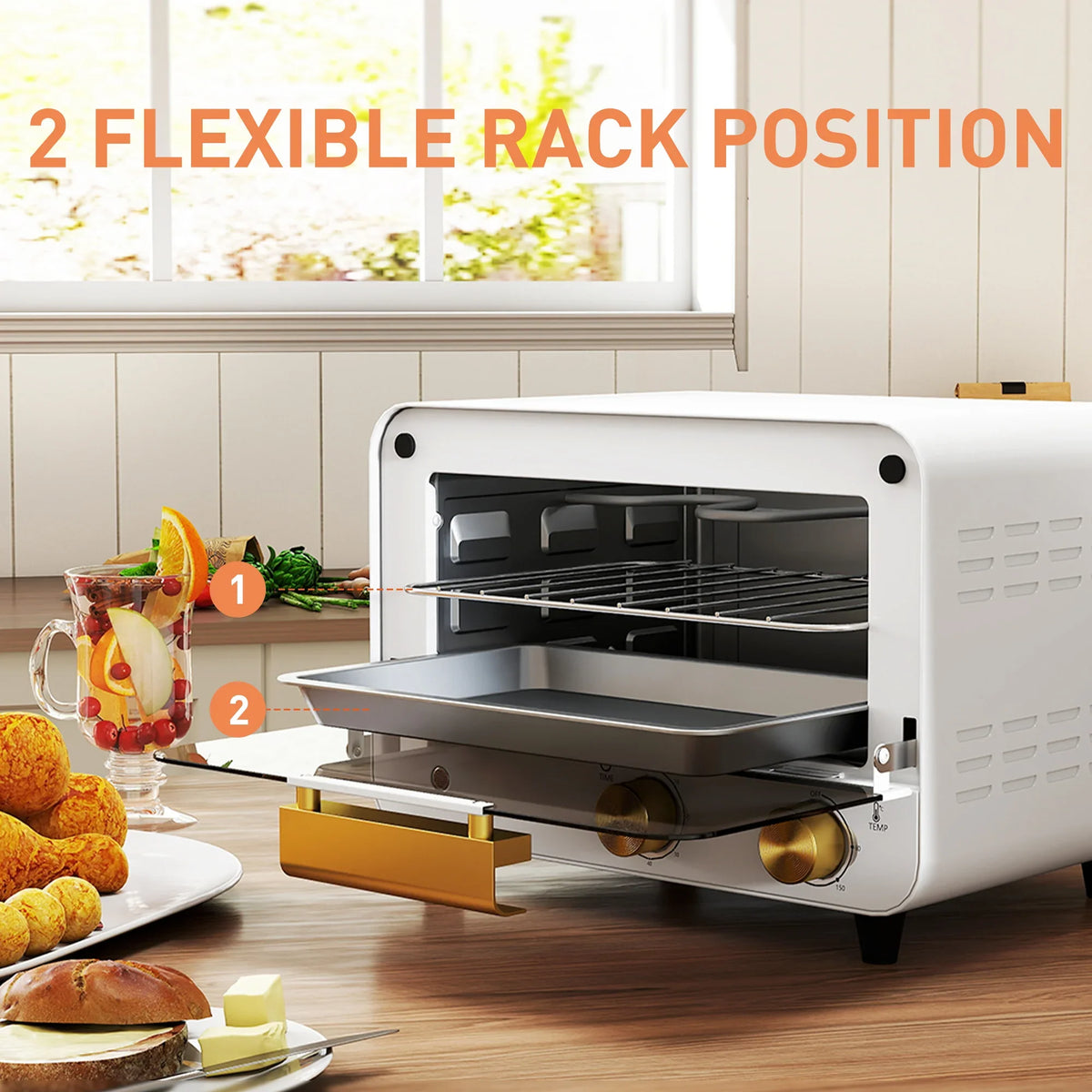 White countertop toaster oven with open door, wire racks, and baking tray