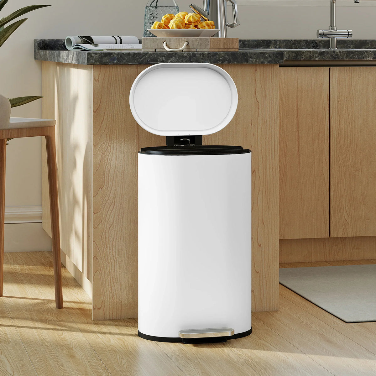 White kitchen pedal bin with curved lid and black base trim, soft close design