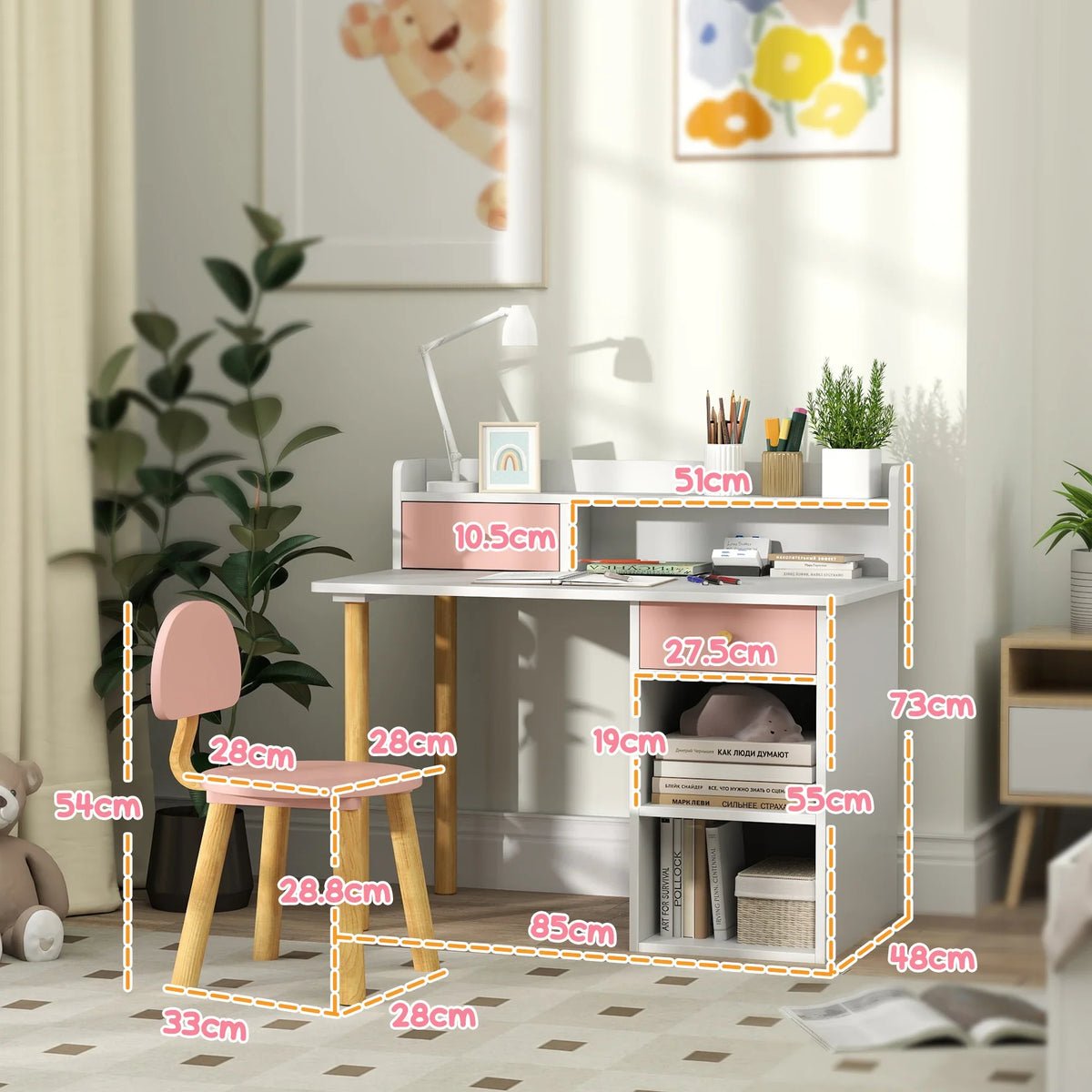 Kids desk and chair set with pink drawer fronts and open storage shelves