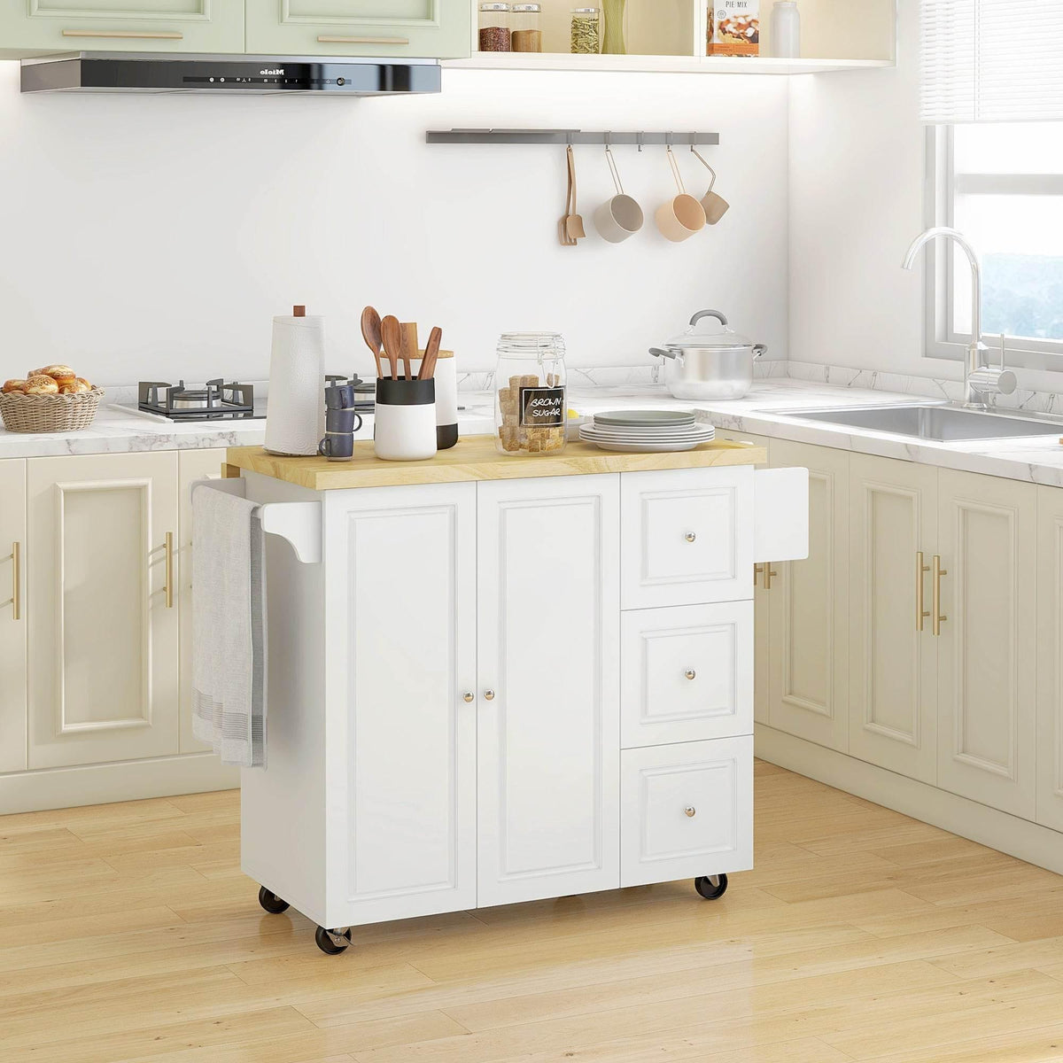White kitchen island cart with cabinet doors, drawers, and wood countertop with towel bar